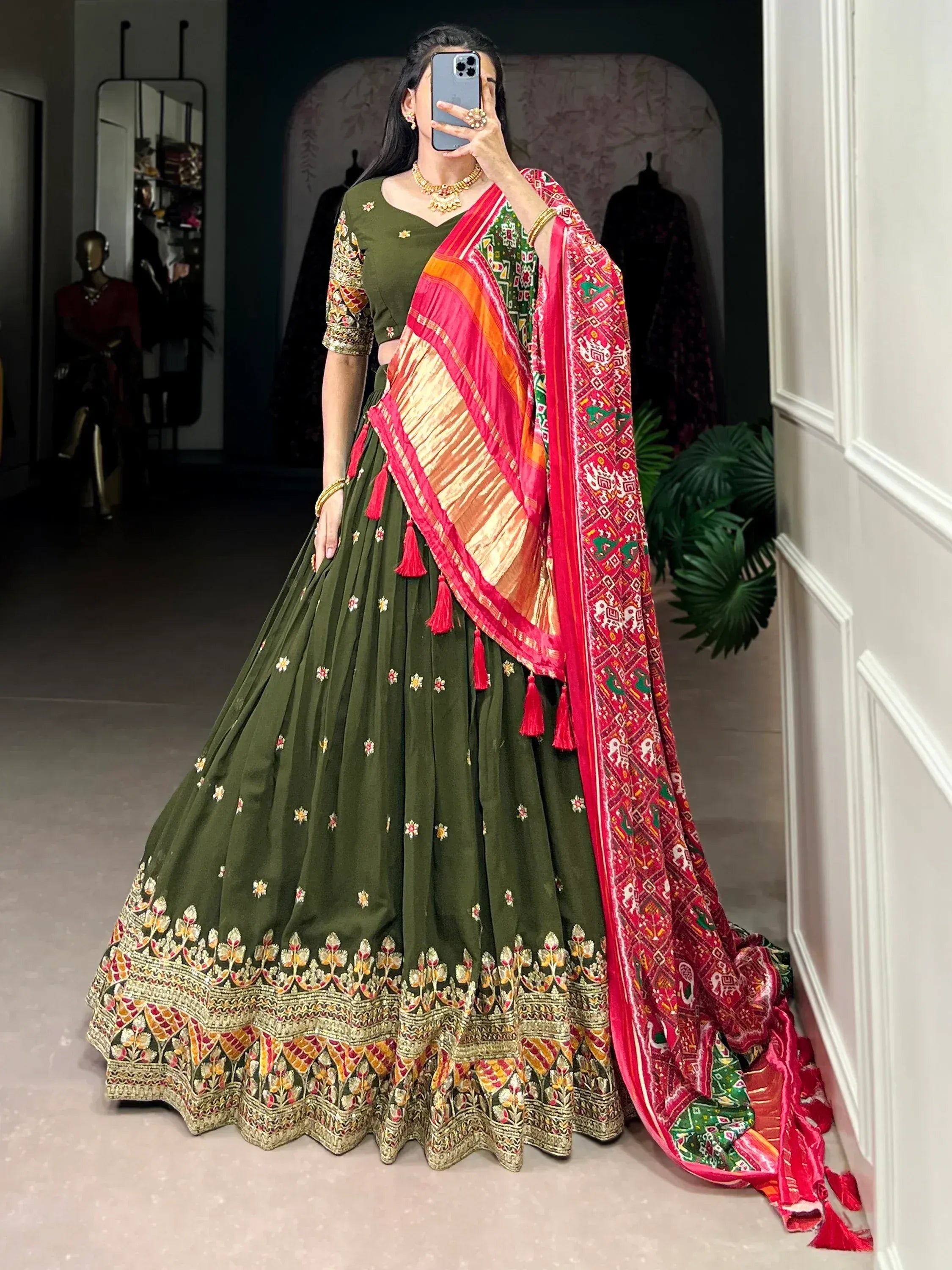 Green embroidered lehenga choli with red patterned dupatta, Indian ethnic wear for women