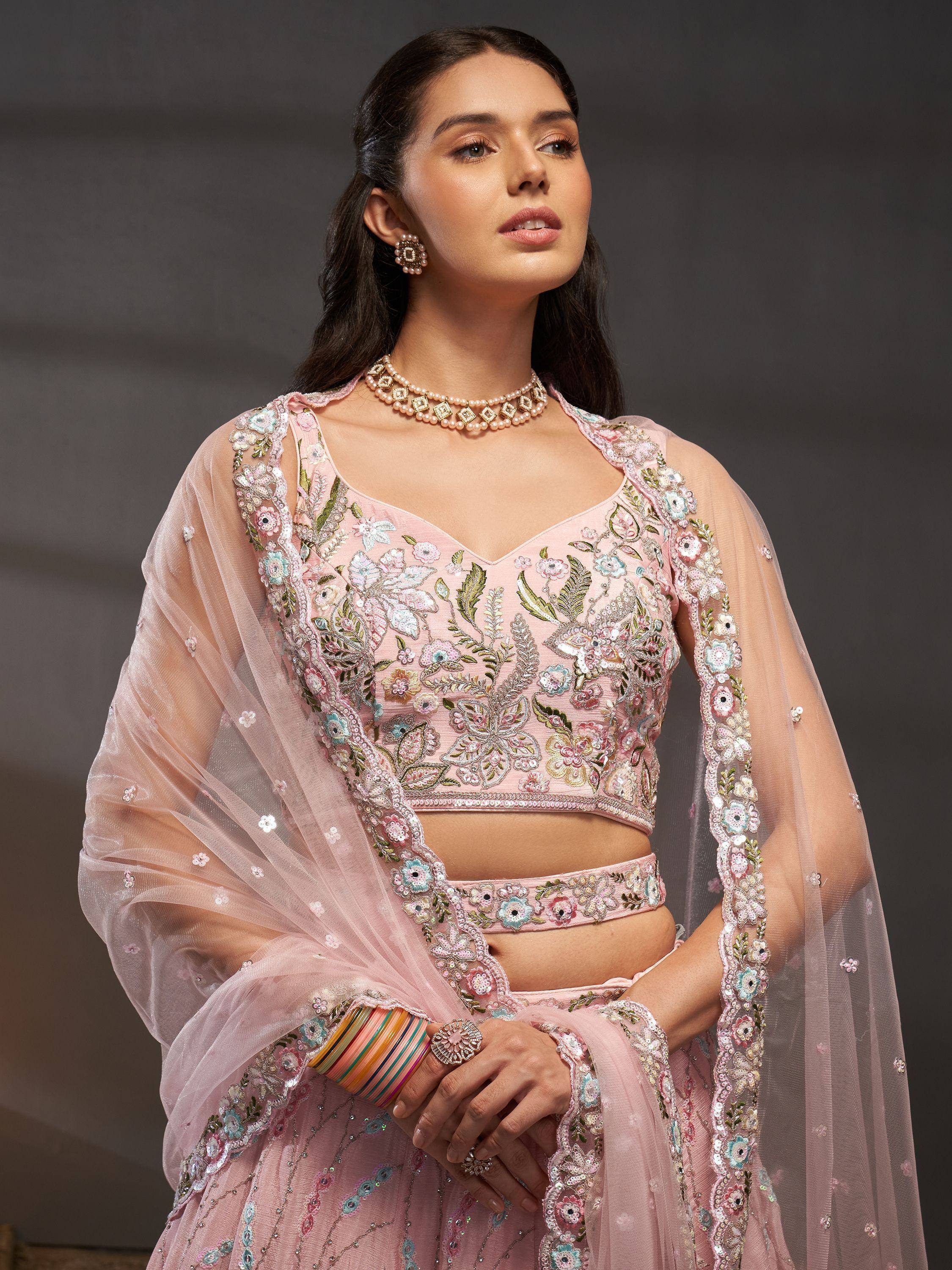 Pink floral embroidered lehenga choli with sheer dupatta, perfect for Indian ethnic wear events