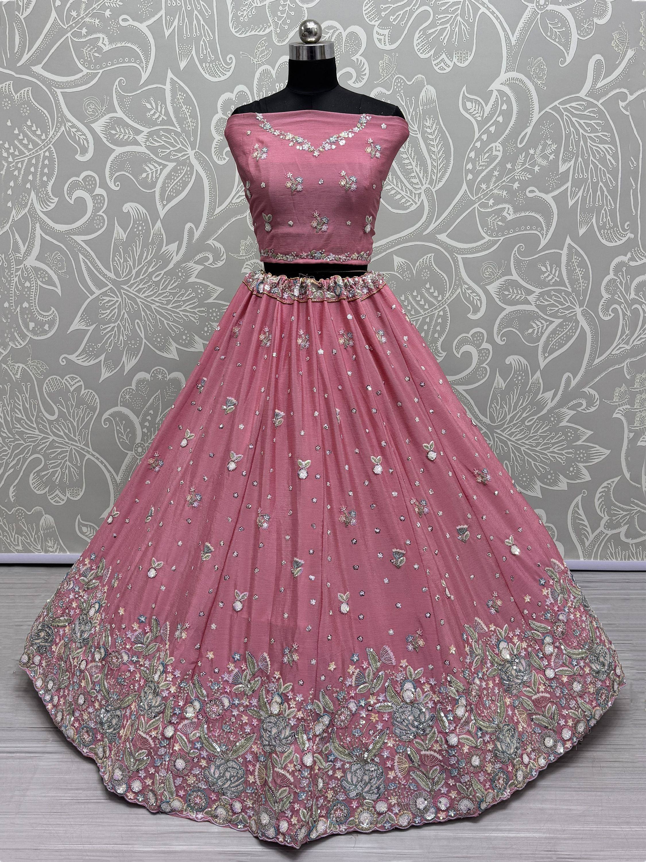 Pink off-shoulder lehenga choli with floral embroidery and sequin work, ideal for Indian ethnic occasions