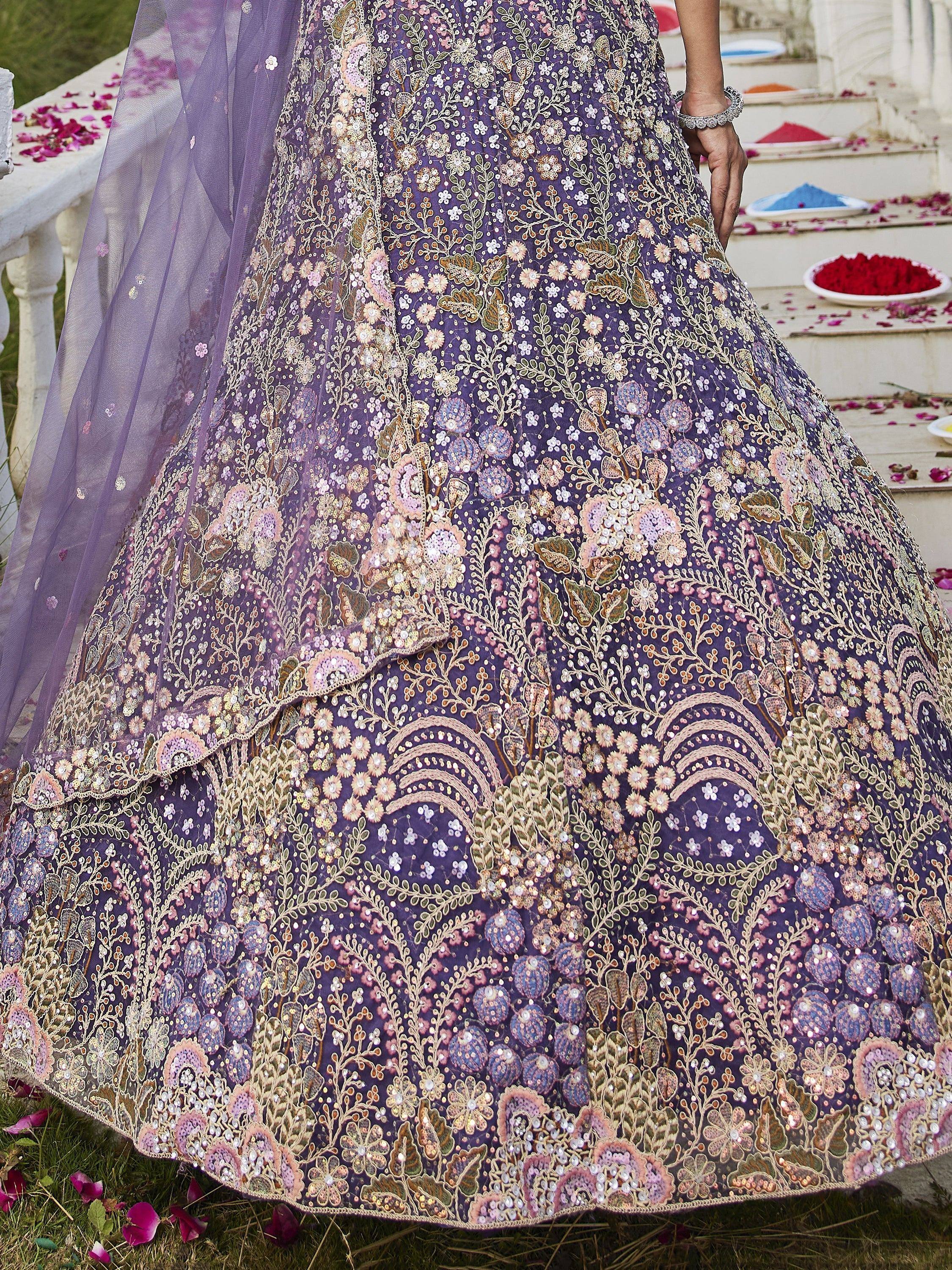 Purple floral embroidered lehenga choli with sequins, perfect for Indian weddings and festive occasions.