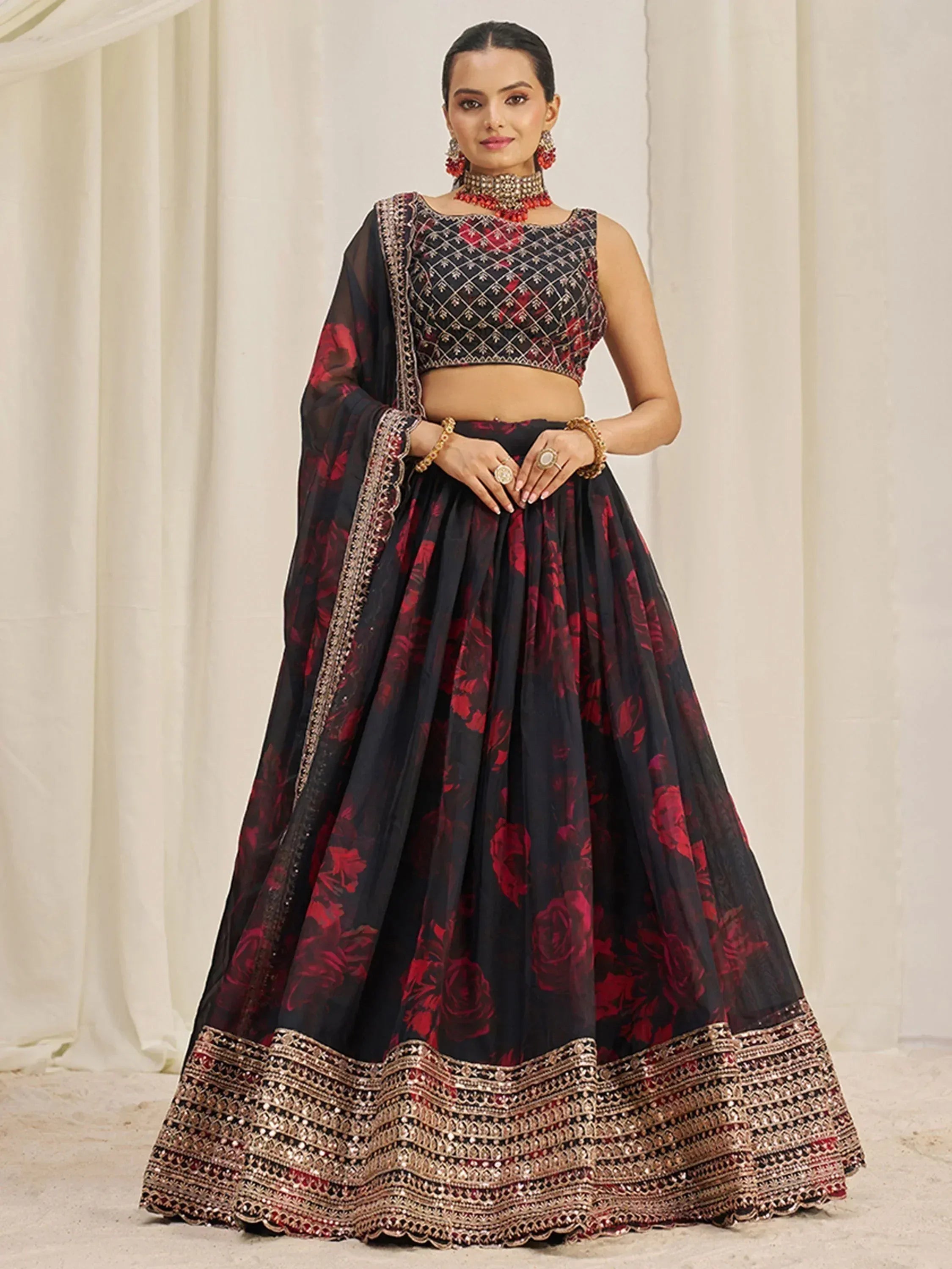 Black and red floral lehenga choli with gold embroidery, perfect for Indian ethnic wear occasions