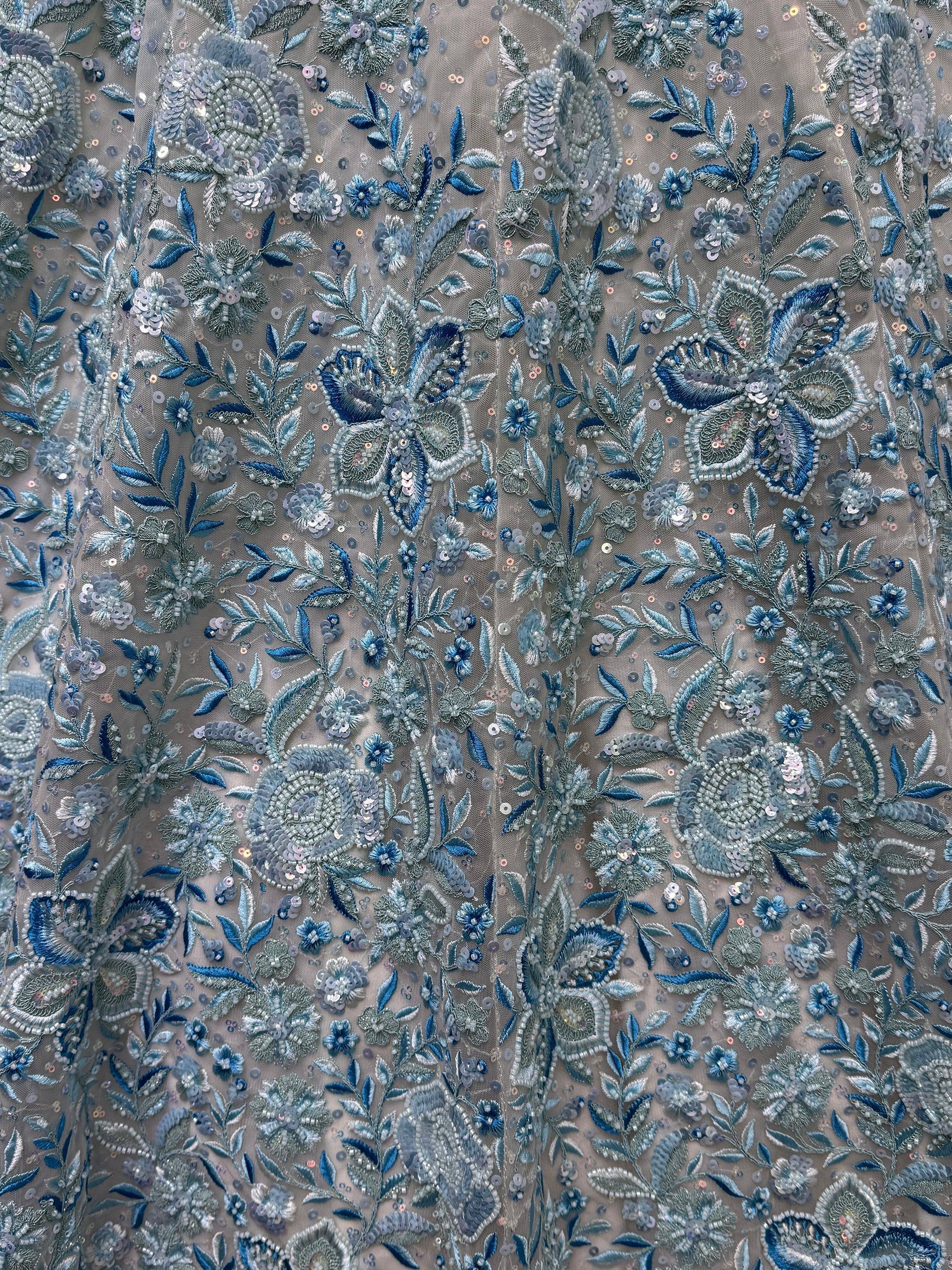 Blue floral embroidered net fabric with sequins and beads for ethnic wear