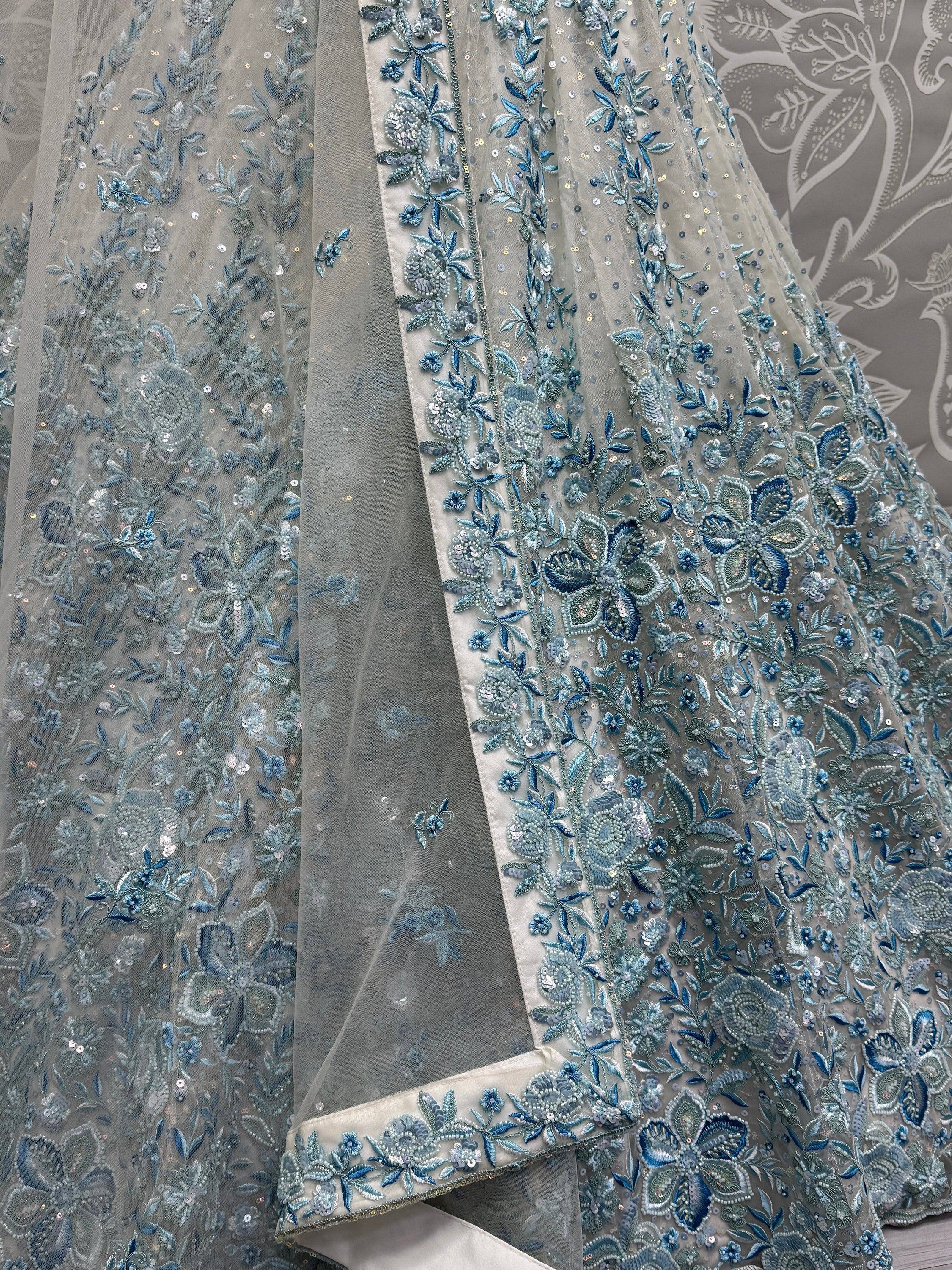 Blue floral embroidered lehenga choli with sequins and net fabric, ethnic Indian wear
