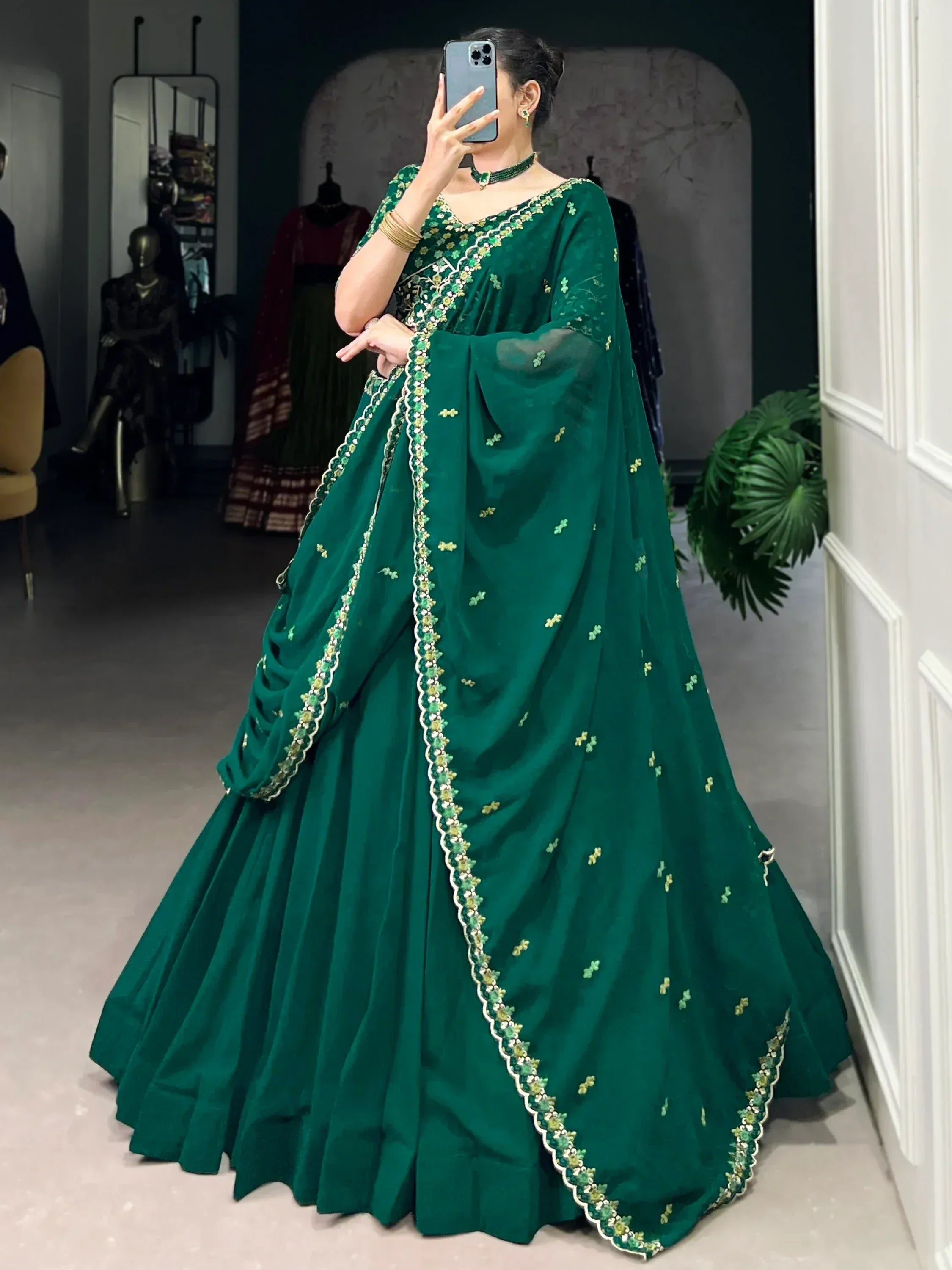Emerald green designer lehenga choli with floral embroidery, perfect for Indian ethnic wear occasions