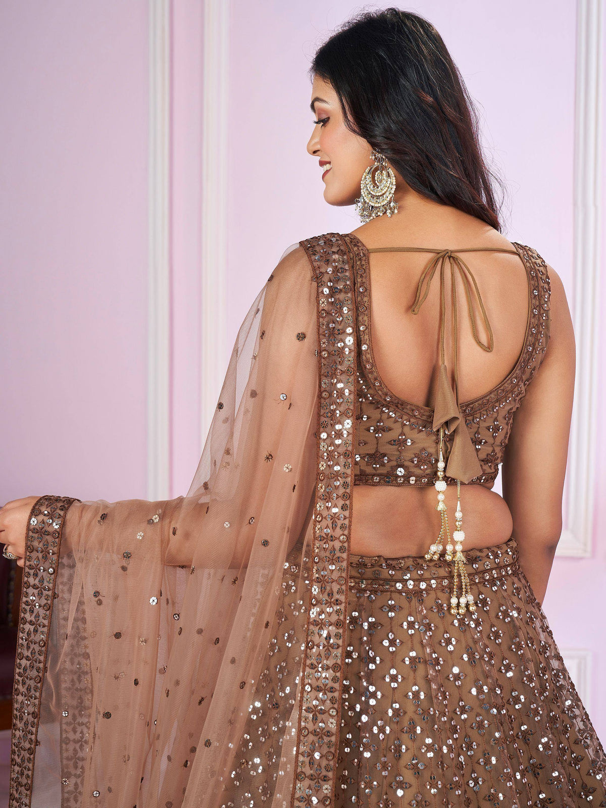 Elegant brown sequin lehenga choli with back tie and sheer dupatta, perfect for Indian ethnic occasions