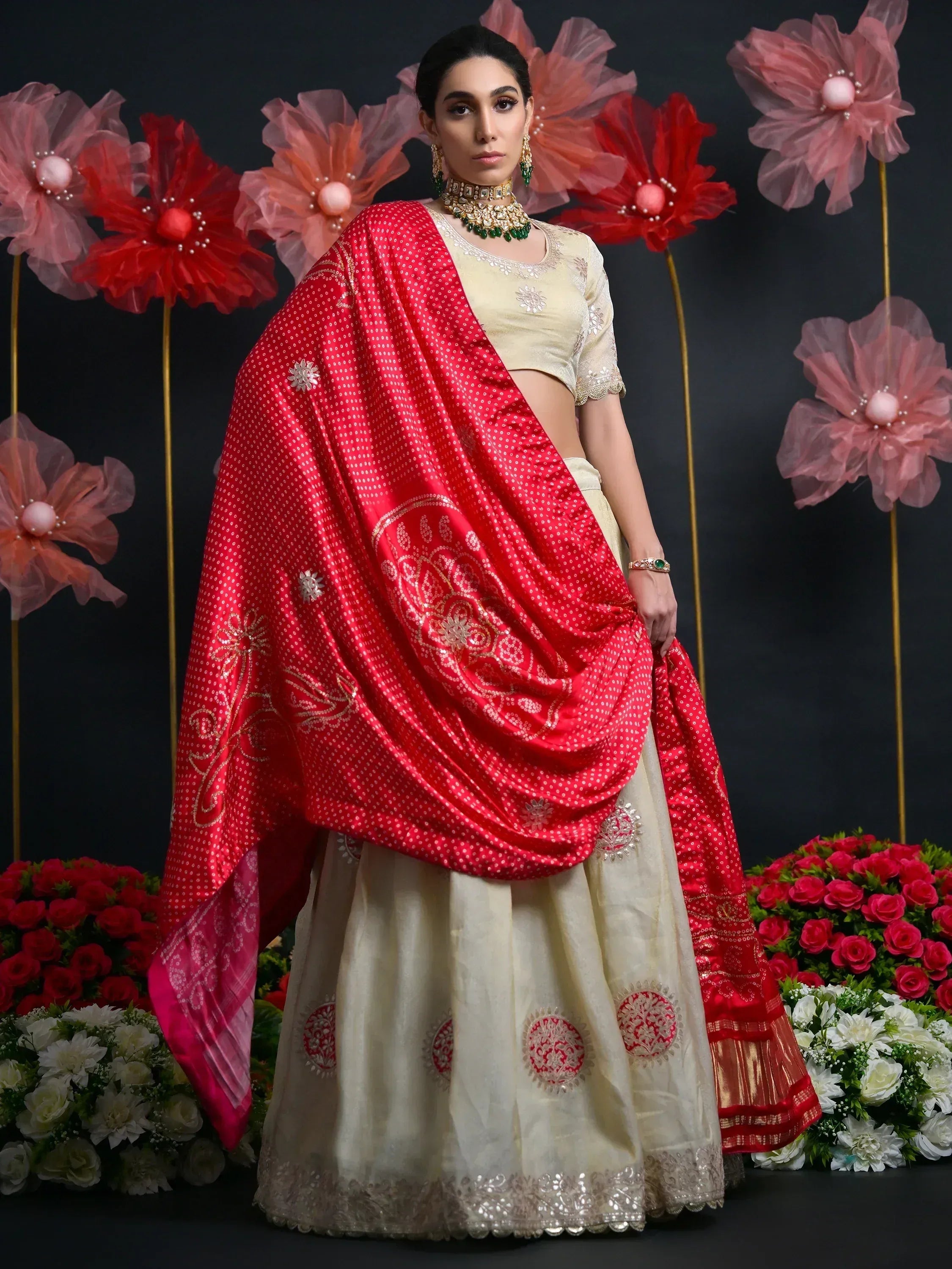 Cream and red designer lehenga choli with embroidered dupatta, perfect for Indian weddings and festive occasions