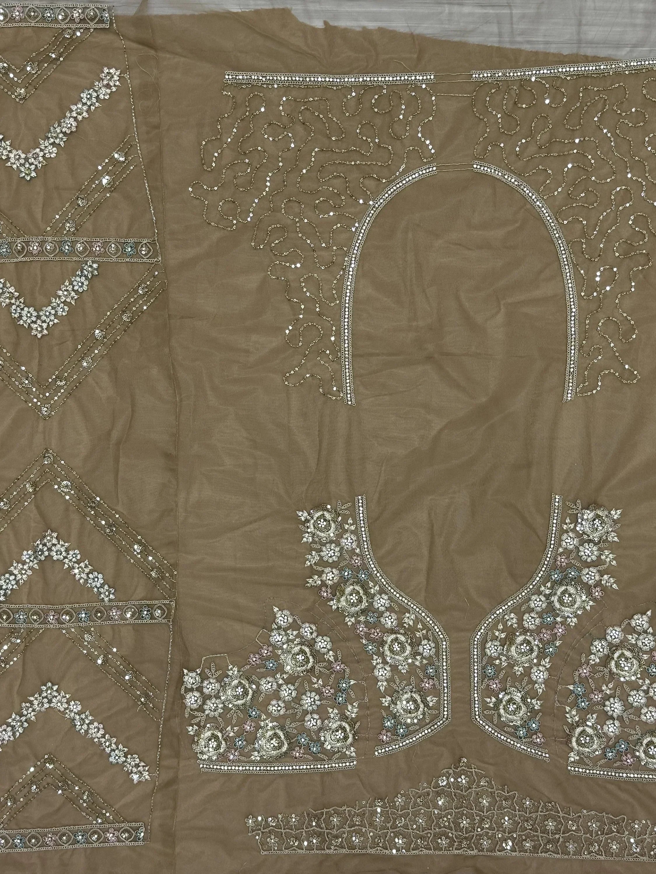 Brown ethnic wear fabric with intricate floral embroidery and sequin detailing for designer lehenga or saree