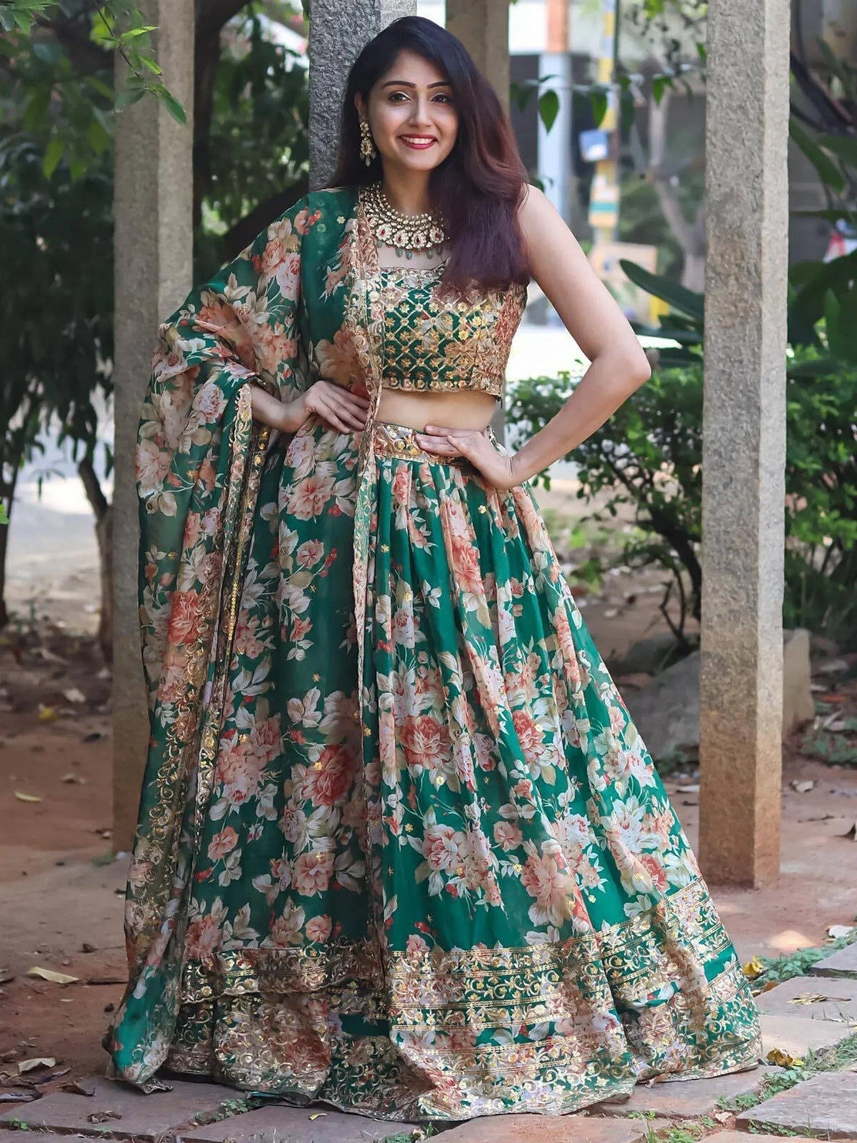 Green floral lehenga choli with gold embroidery, perfect for Indian ethnic wear and festive occasions.