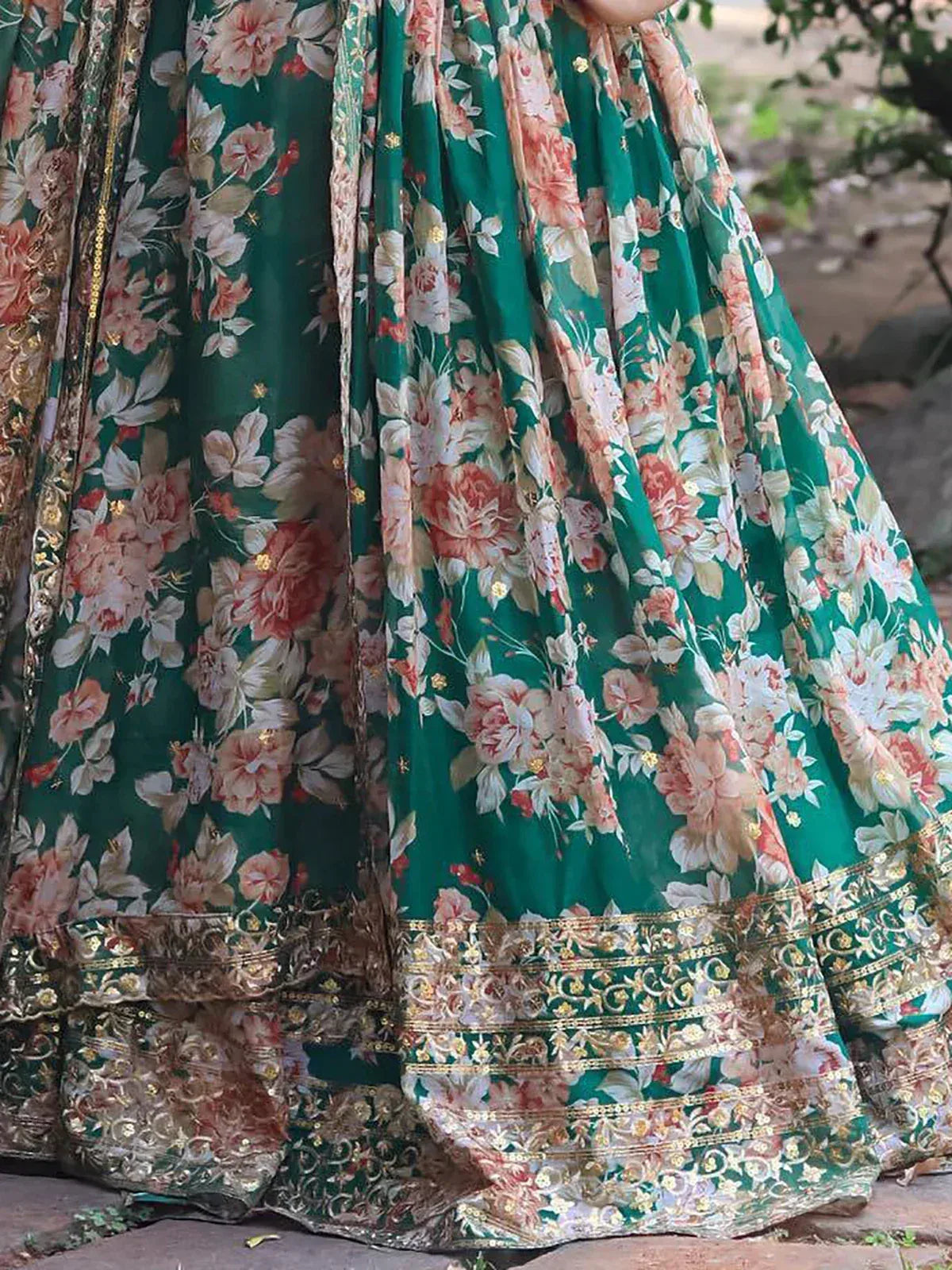 Emerald green floral lehenga with gold embroidery, perfect for Indian ethnic wear and festive occasions.