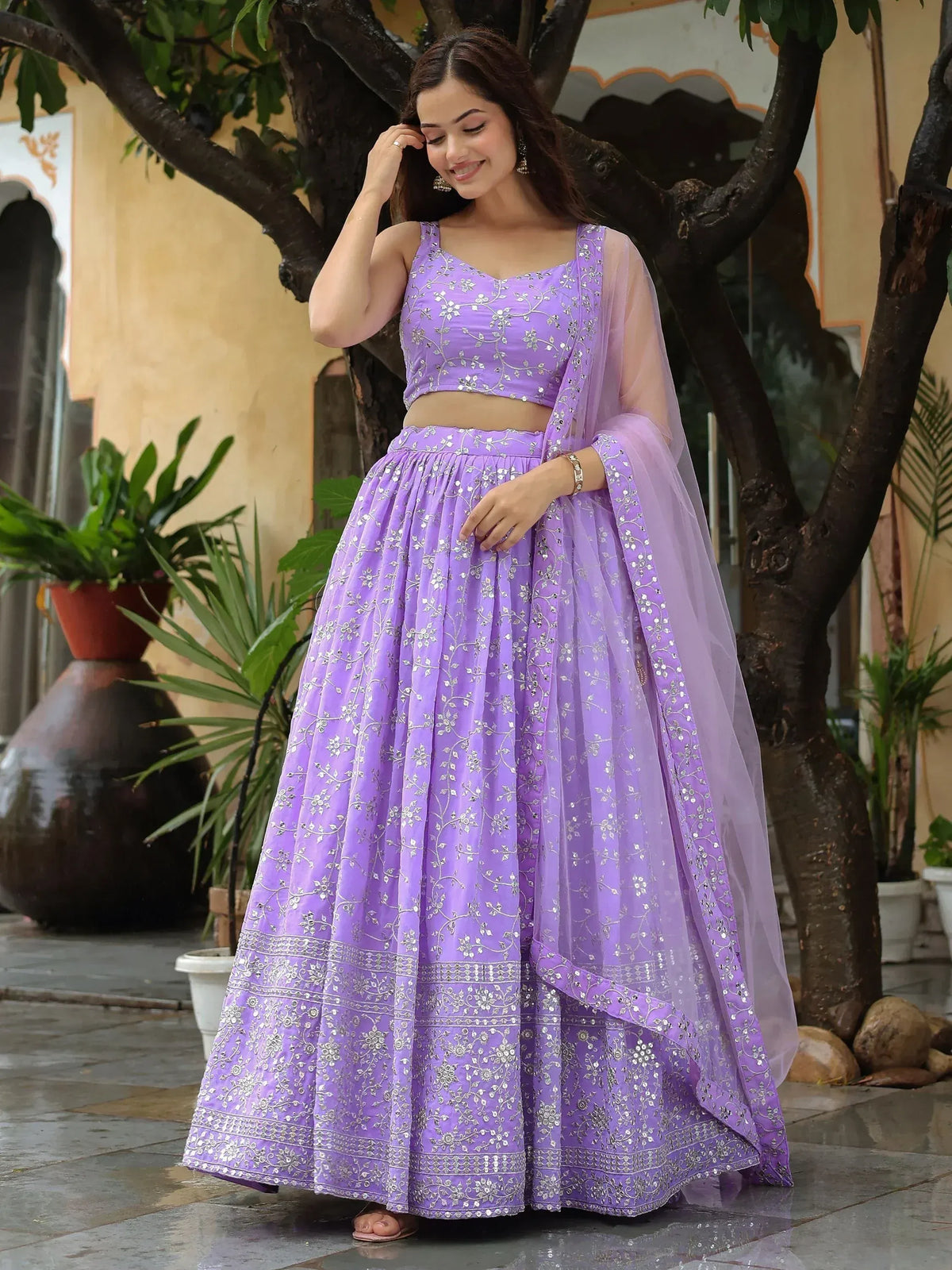 Lavender embroidered lehenga choli with sheer dupatta, perfect for Indian ethnic occasions
