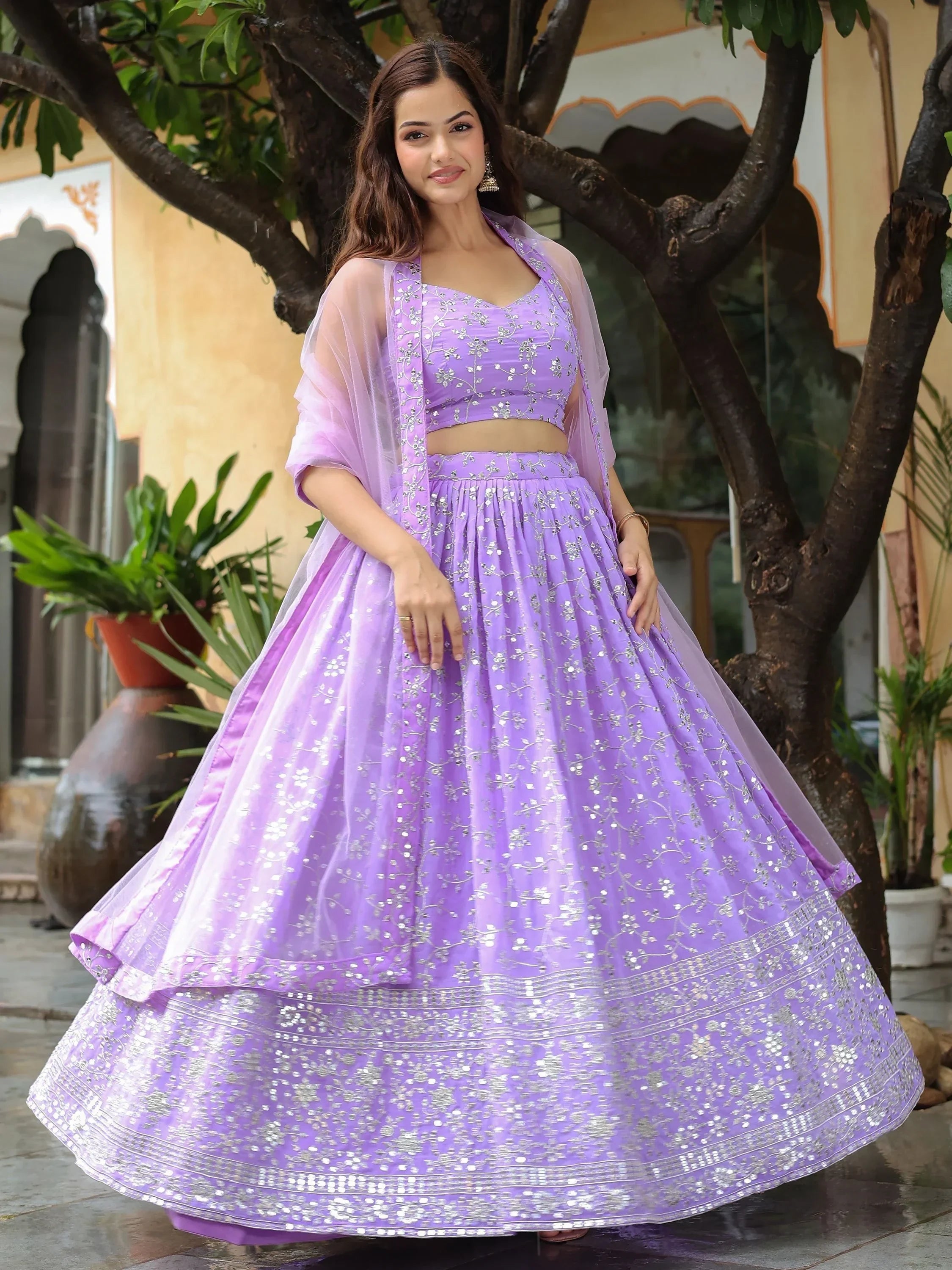 Lavender designer lehenga choli with silver embroidery and sheer dupatta, perfect for Indian ethnic occasions
