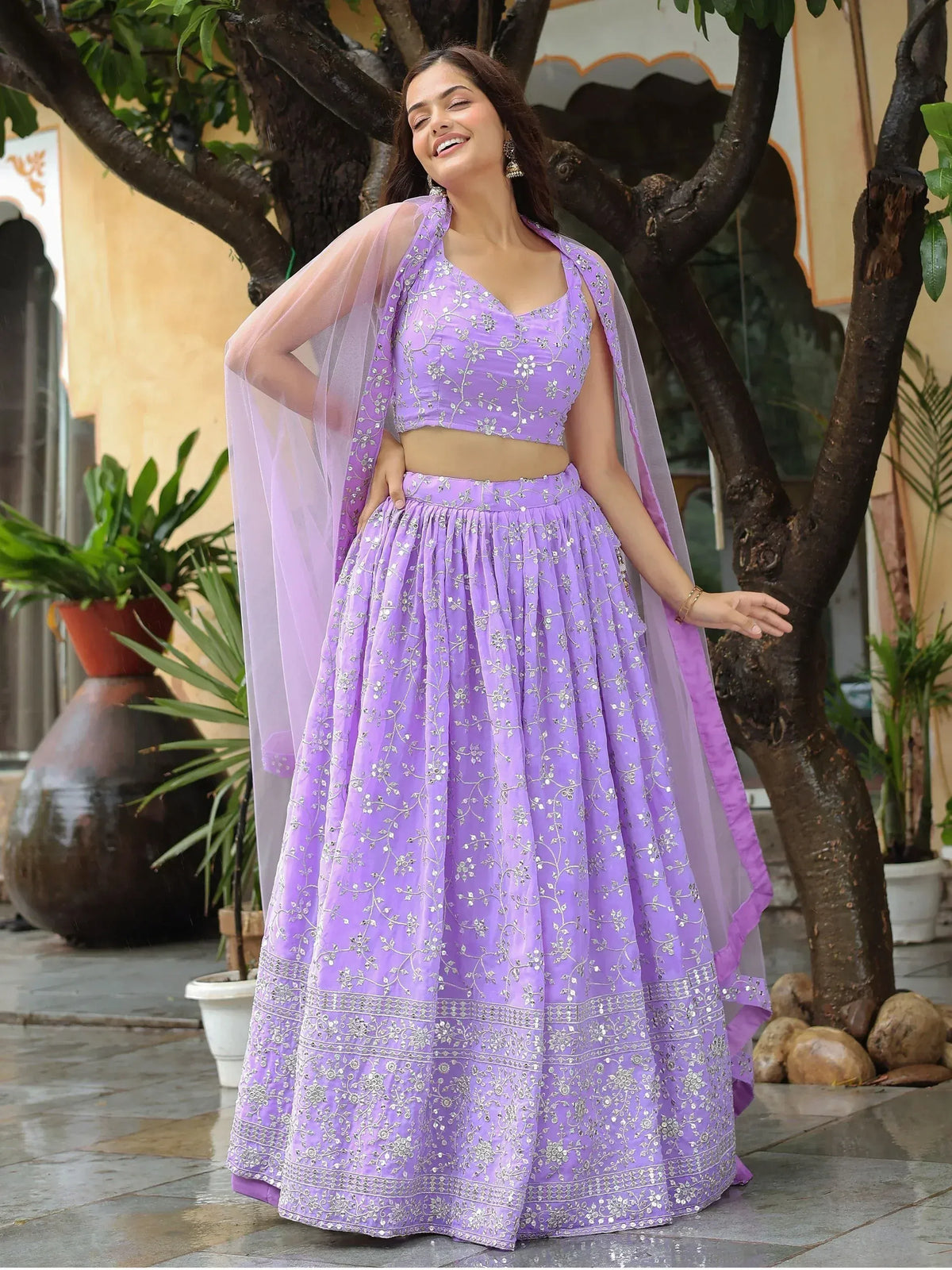Lavender embroidered lehenga choli with sheer dupatta, perfect for Indian ethnic wear occasions.