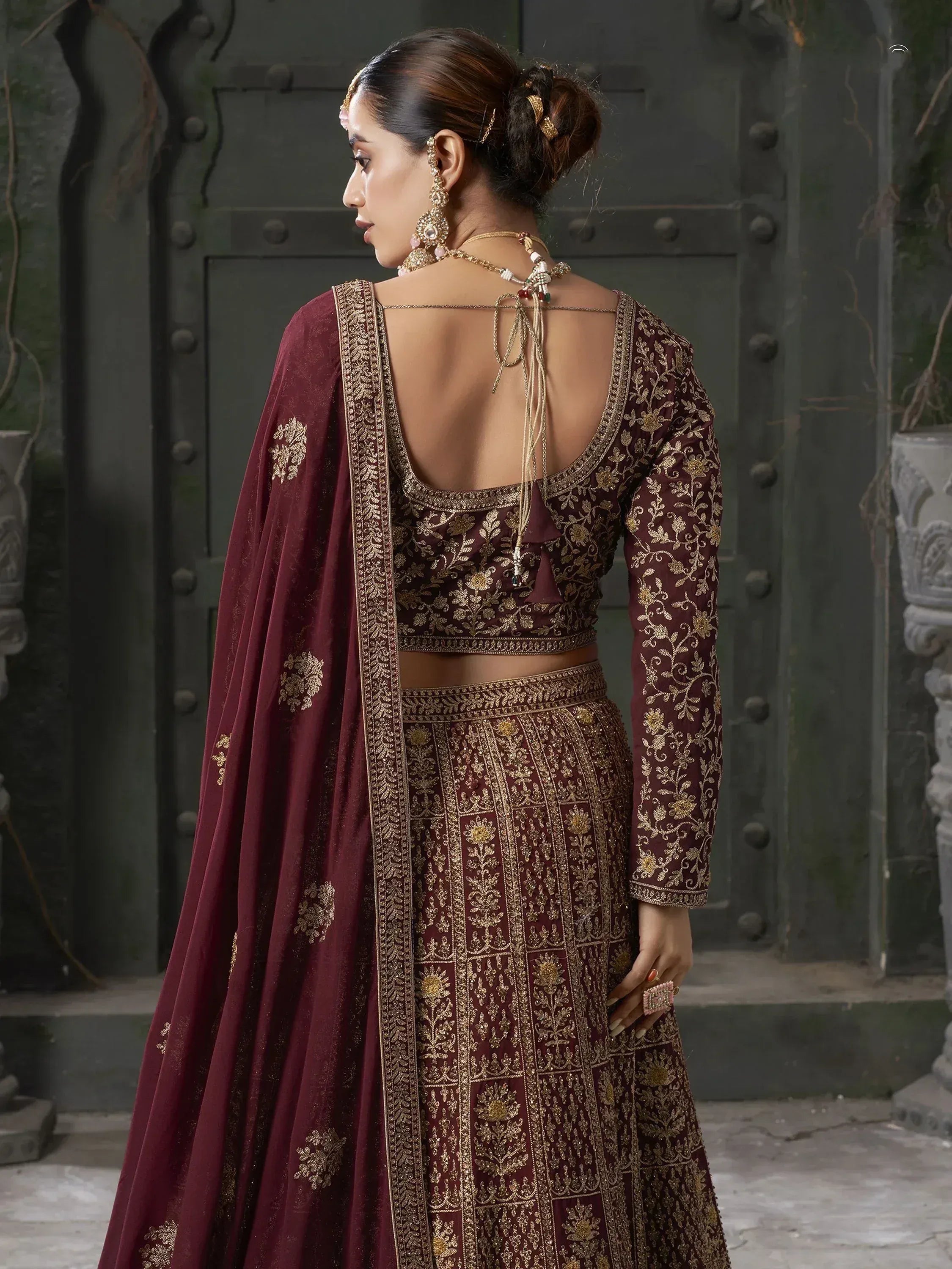 Maroon designer lehenga choli with gold embroidery, back view, ethnic Indian wear