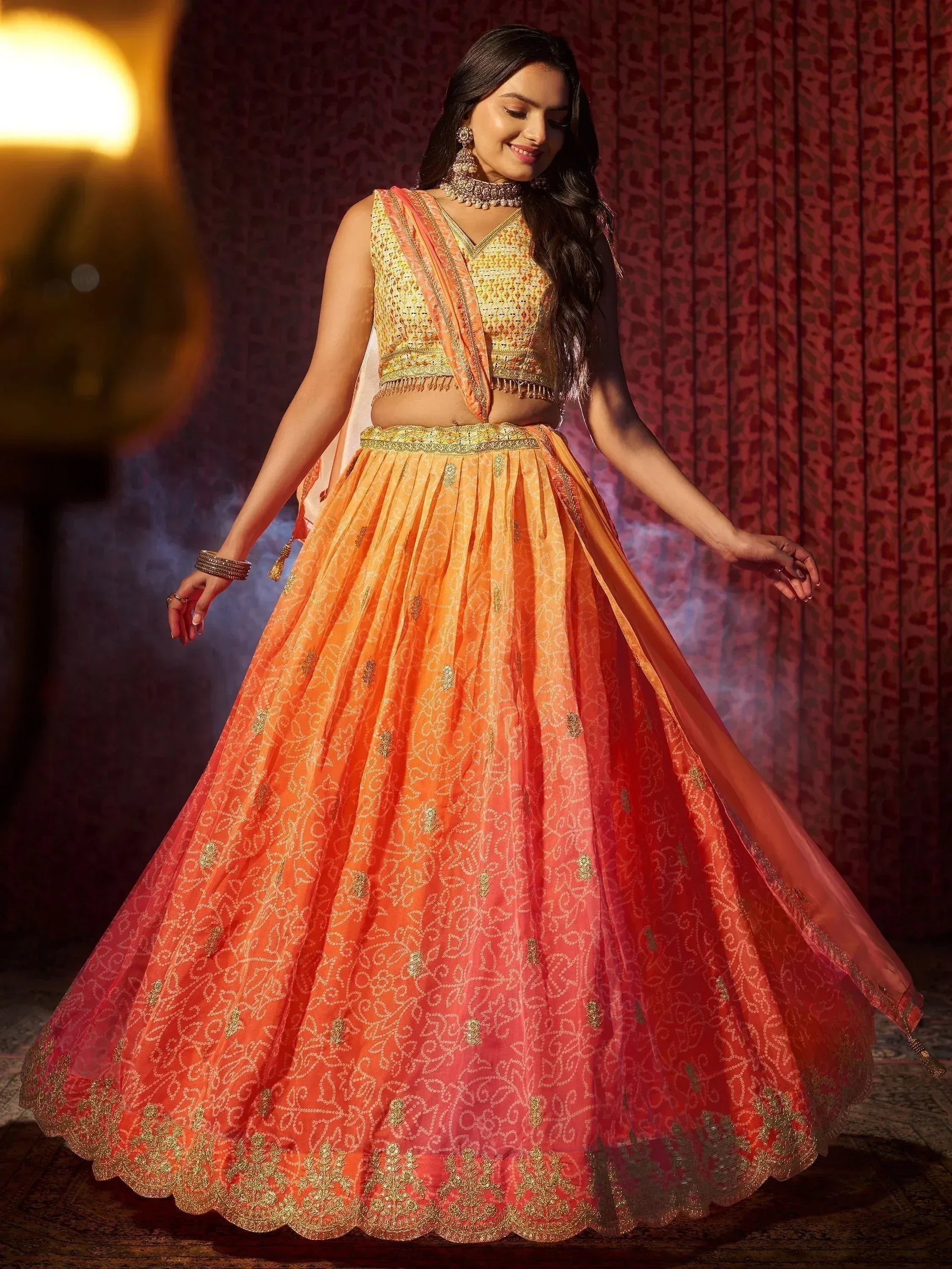 Orange and gold embroidered lehenga choli with dupatta, Indian ethnic wear for weddings and festivals