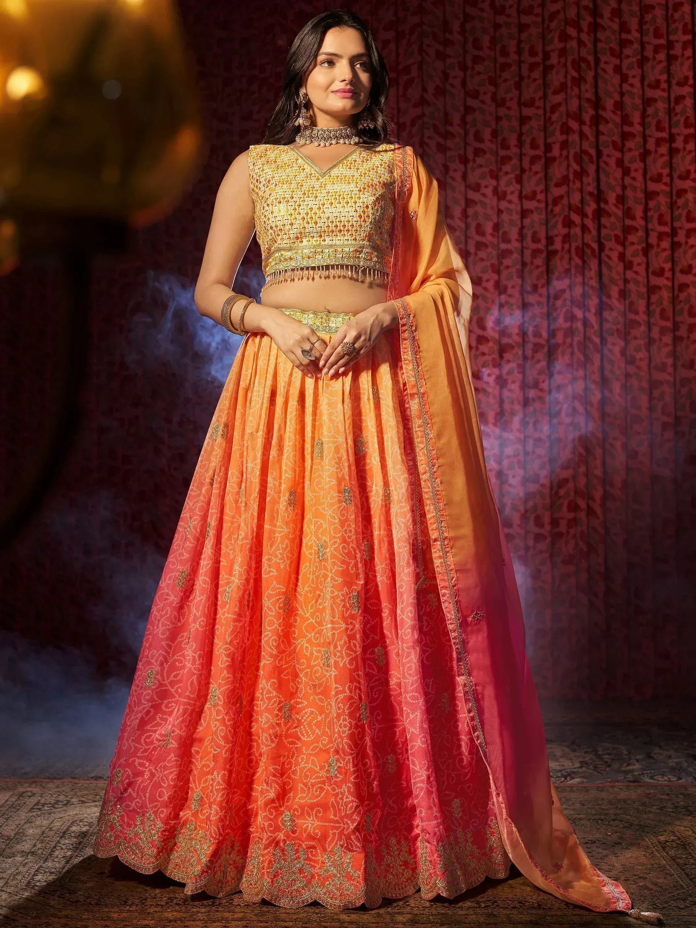 Orange and gold embroidered lehenga choli with dupatta, Indian ethnic wear for weddings and festivals