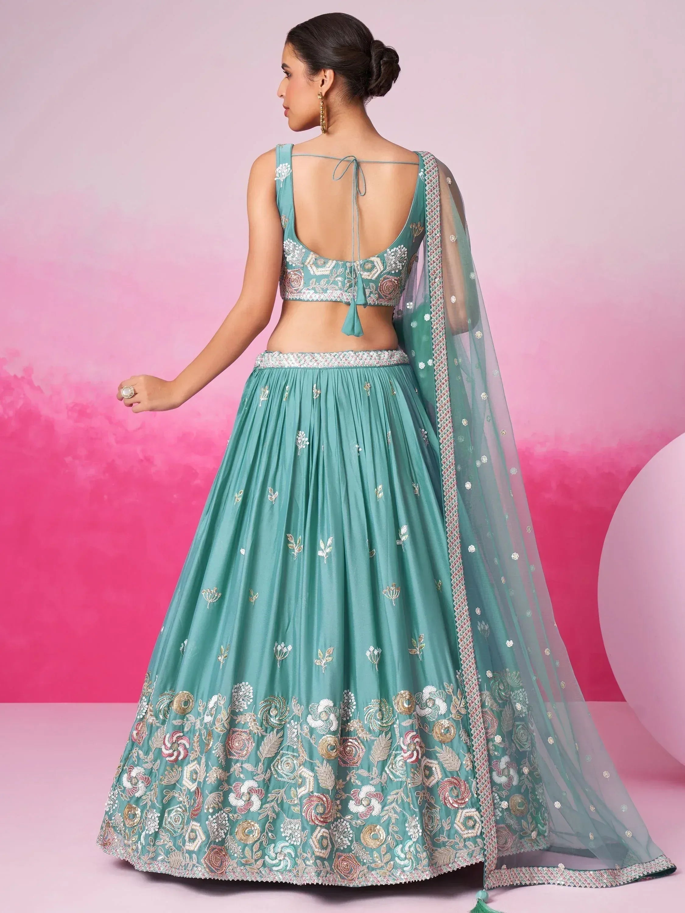 Teal designer lehenga choli with floral embroidery and sheer dupatta, Indian ethnic wear