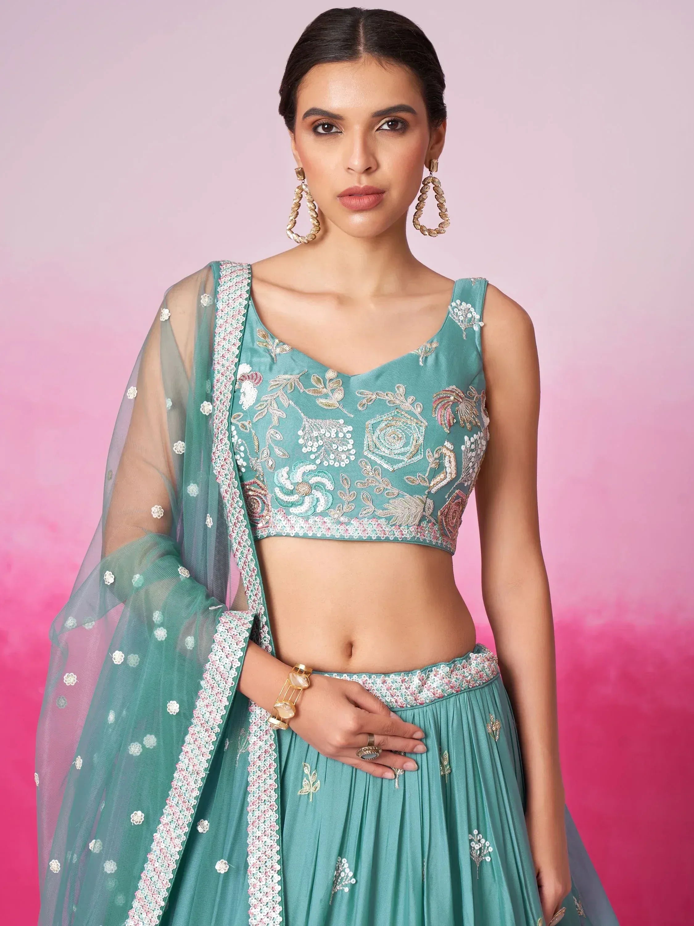Teal embroidered lehenga choli with floral motifs and sheer dupatta, Indian ethnic wear