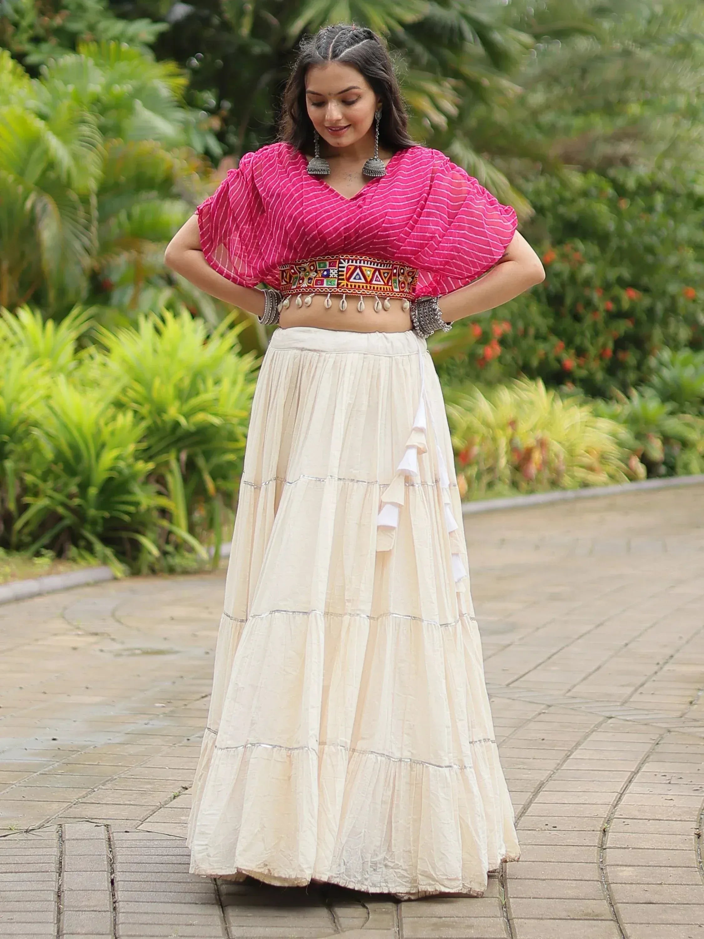 Pink striped crop top with embroidered belt and cream tiered skirt, Indian ethnic wear