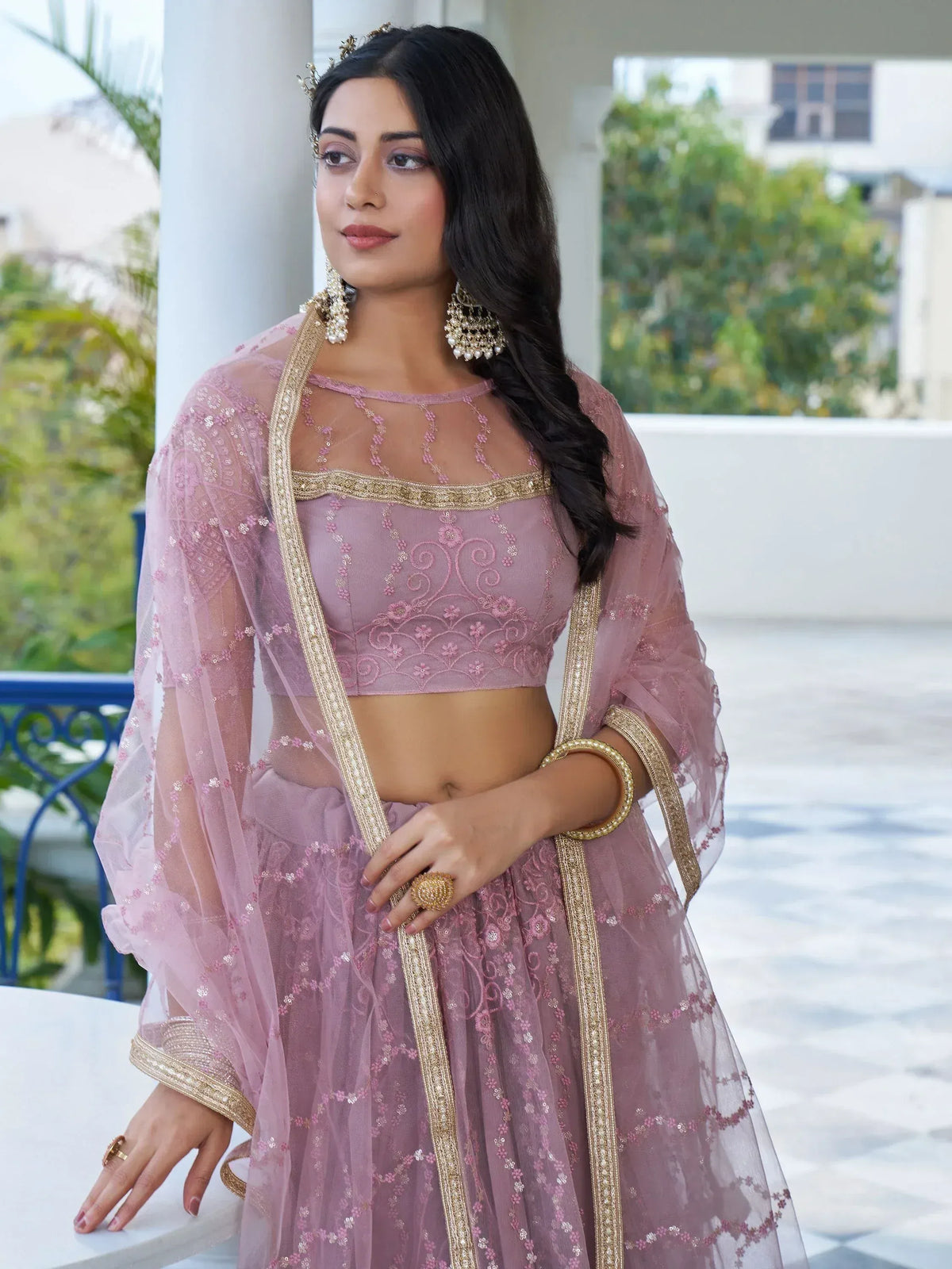 Pink embroidered lehenga choli with gold detailing, perfect for Indian ethnic wear occasions
