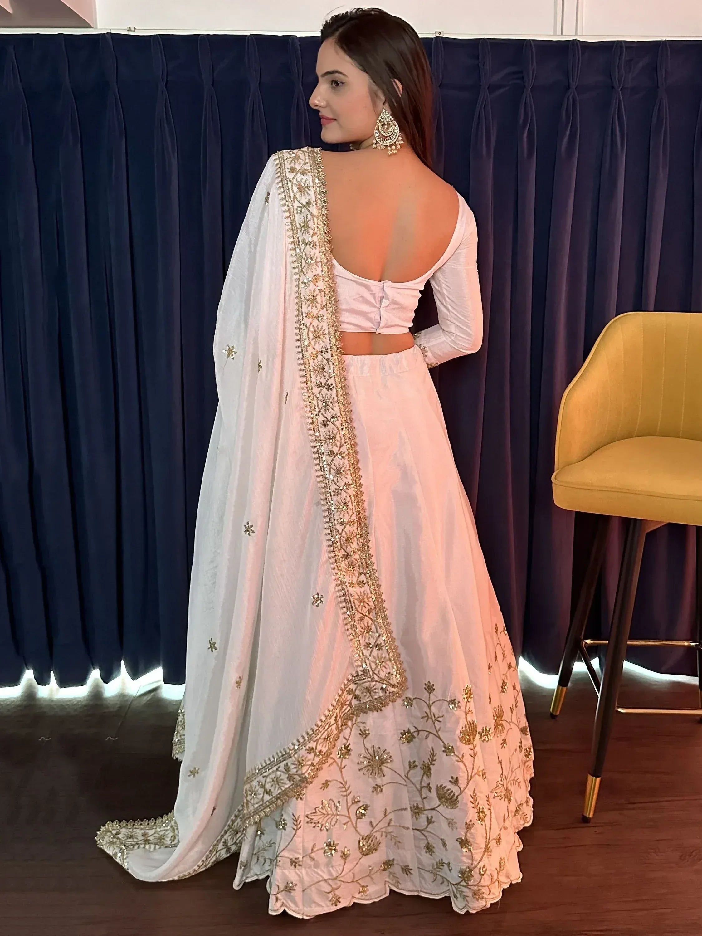 White and gold embroidered lehenga choli with open back and dupatta, Indian ethnic wear
