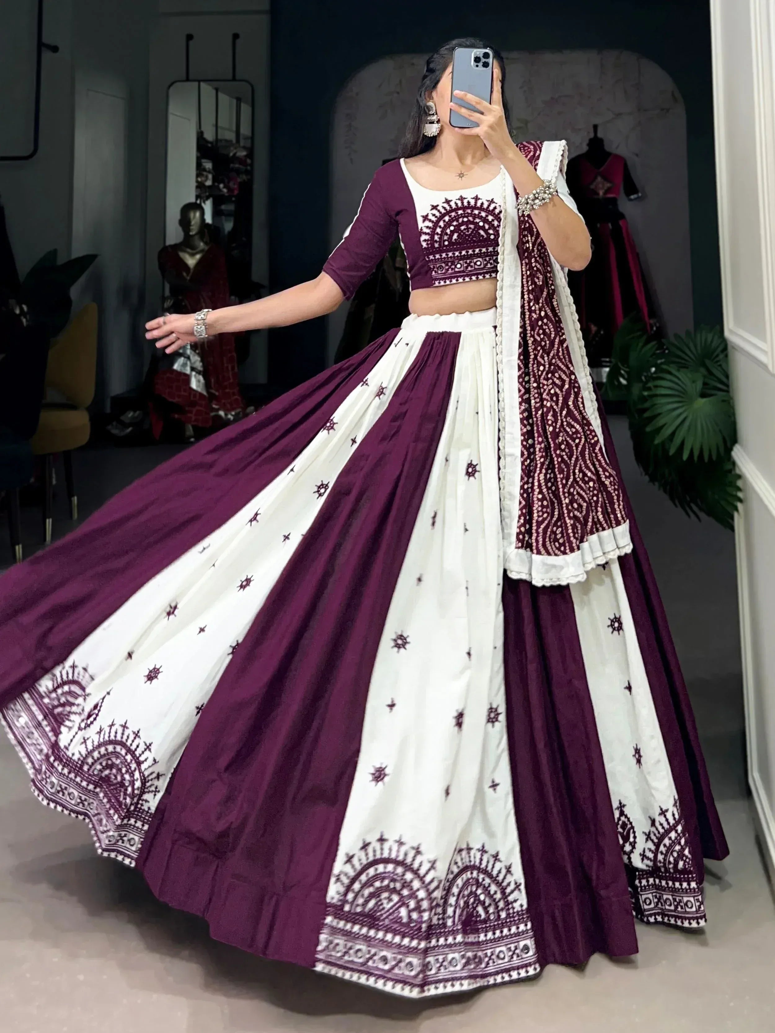Elegant maroon and white printed lehenga choli with mirror work, perfect for Indian ethnic wear occasions.