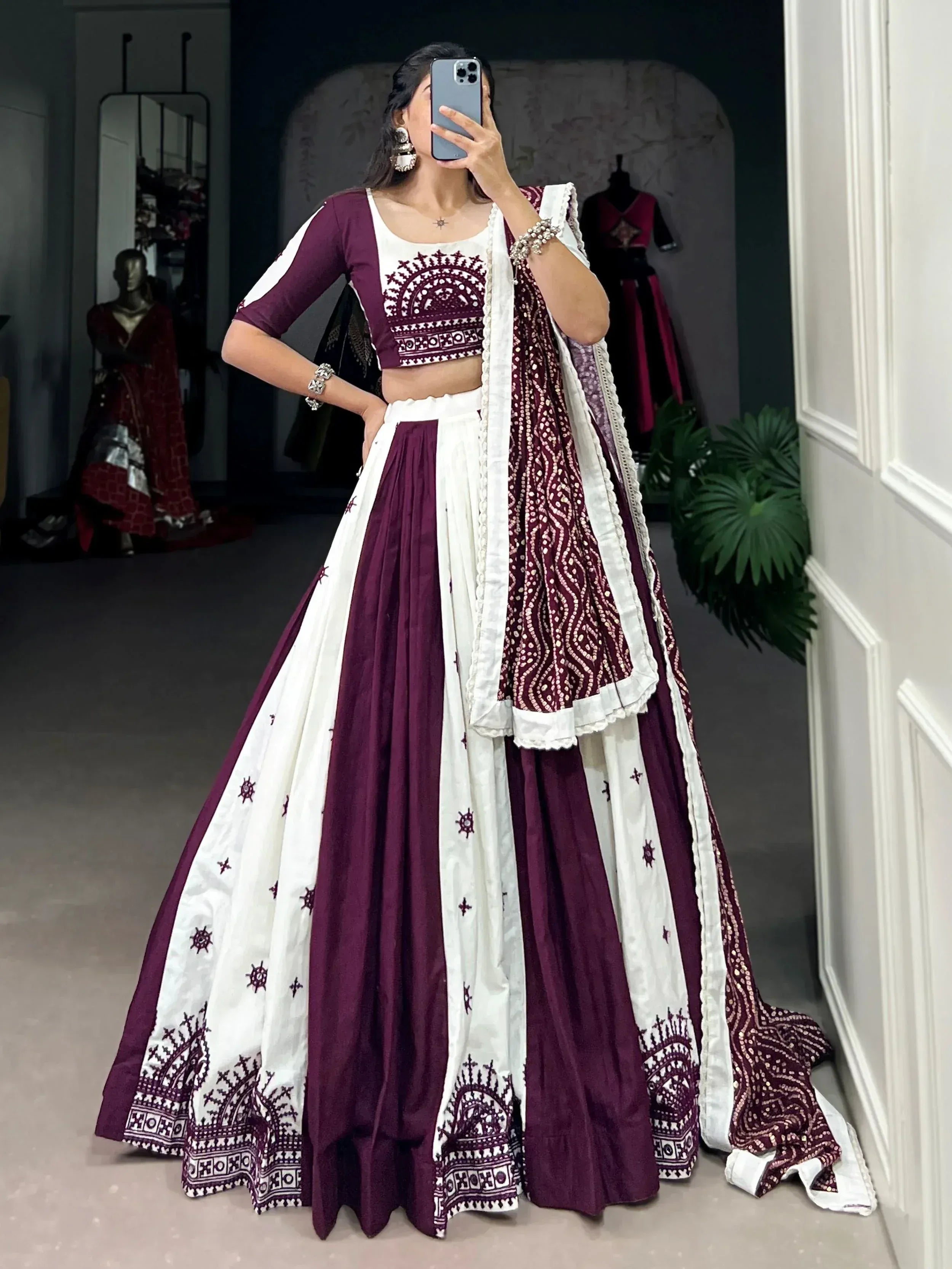 Maroon and white embroidered lehenga choli with mirror work, perfect for Indian ethnic wear occasions