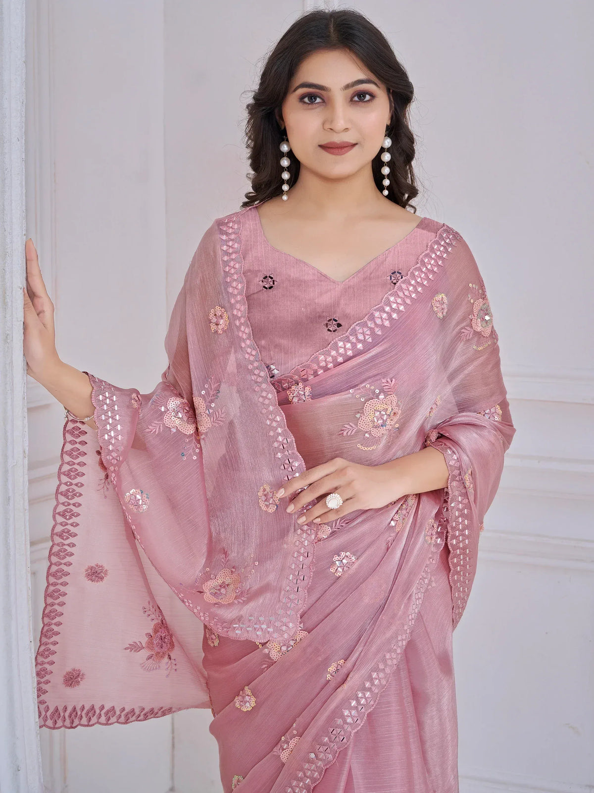 Pink embroidered saree with floral sequin details, perfect for Indian ethnic wear occasions