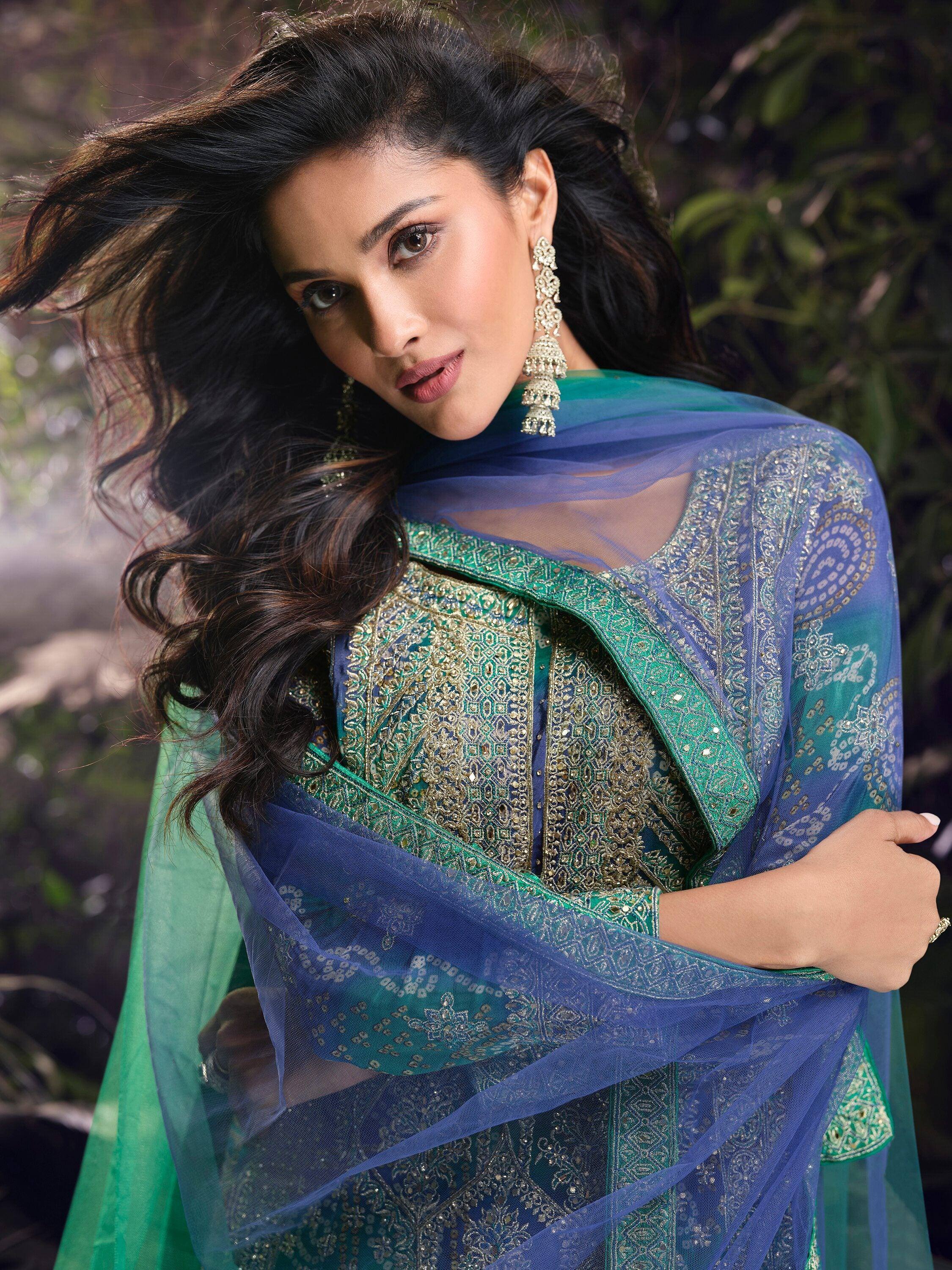 Elegant Indian ethnic wear with blue and green embroidered salwar kameez, perfect for festive occasions.