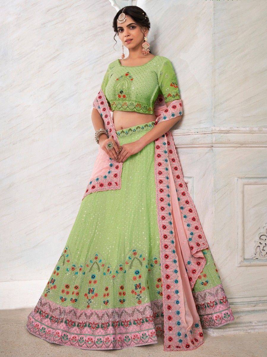 Green embroidered lehenga choli with pink dupatta, Indian ethnic wear for weddings and festivals