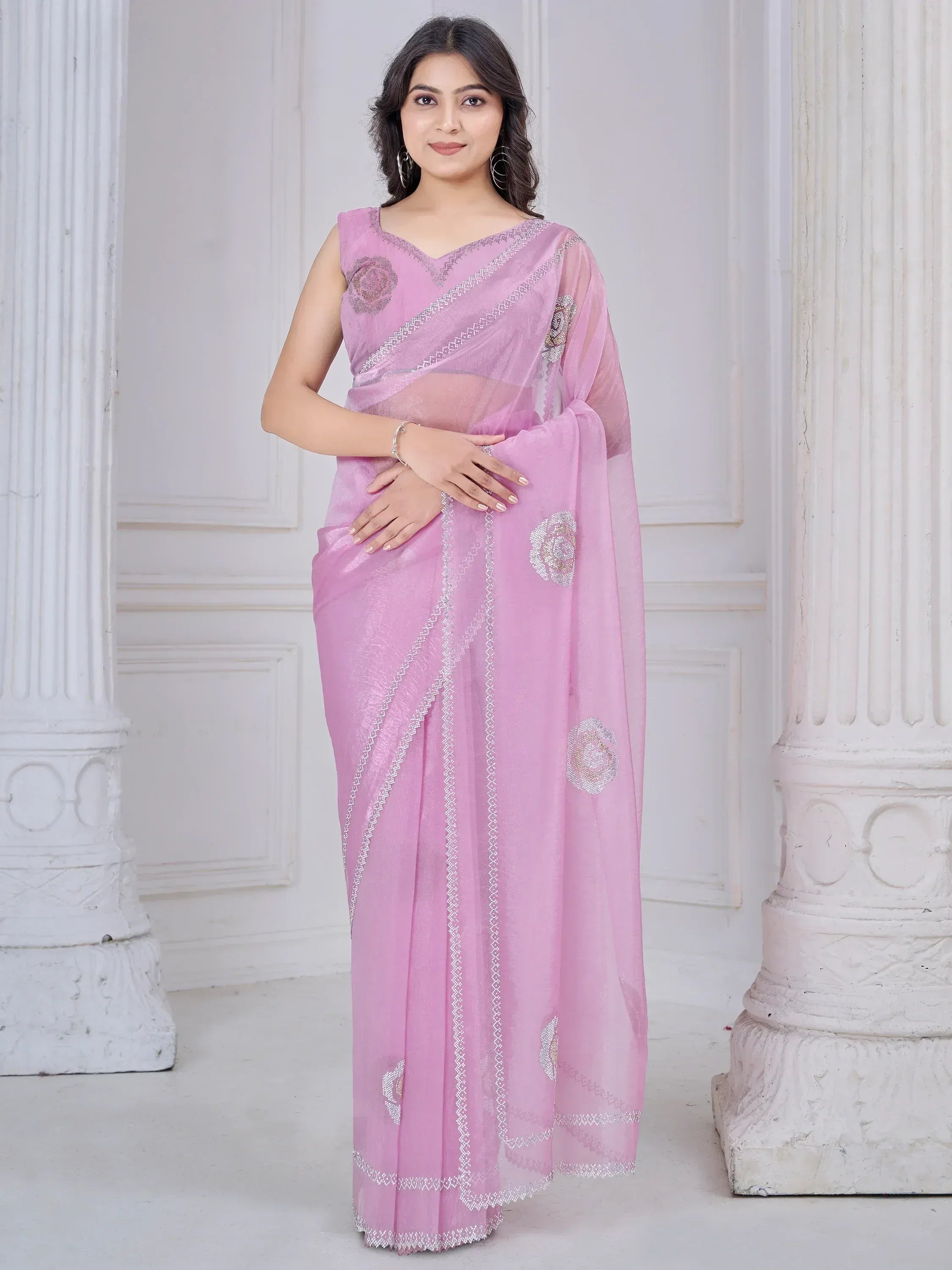 Pink designer saree with floral embroidery and silver border, perfect for ethnic occasions