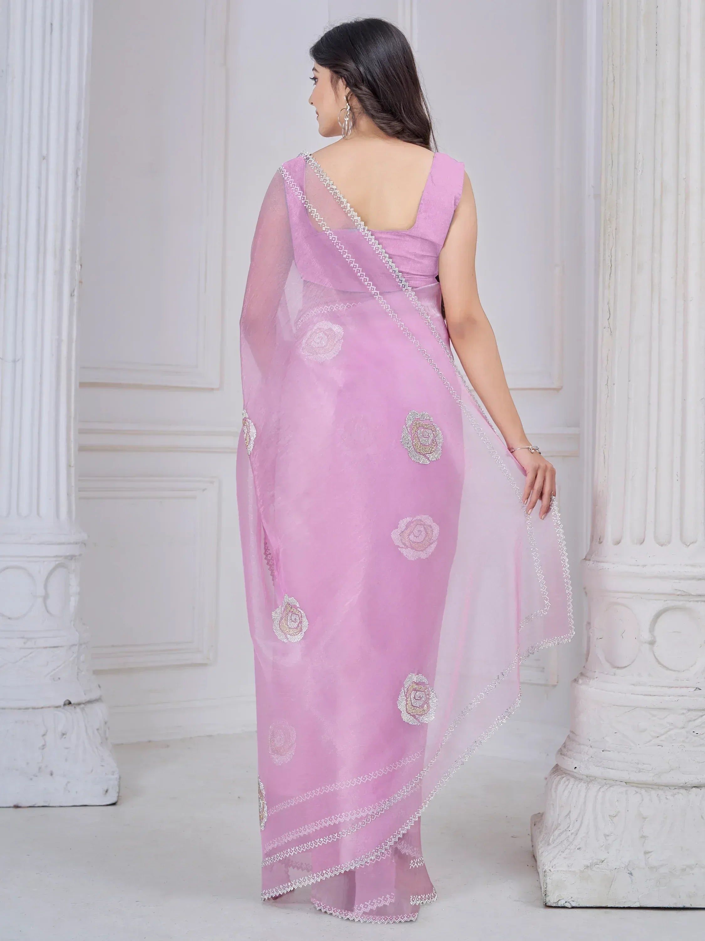 Pink designer saree with floral embroidery and sequin border, elegant ethnic wear for women