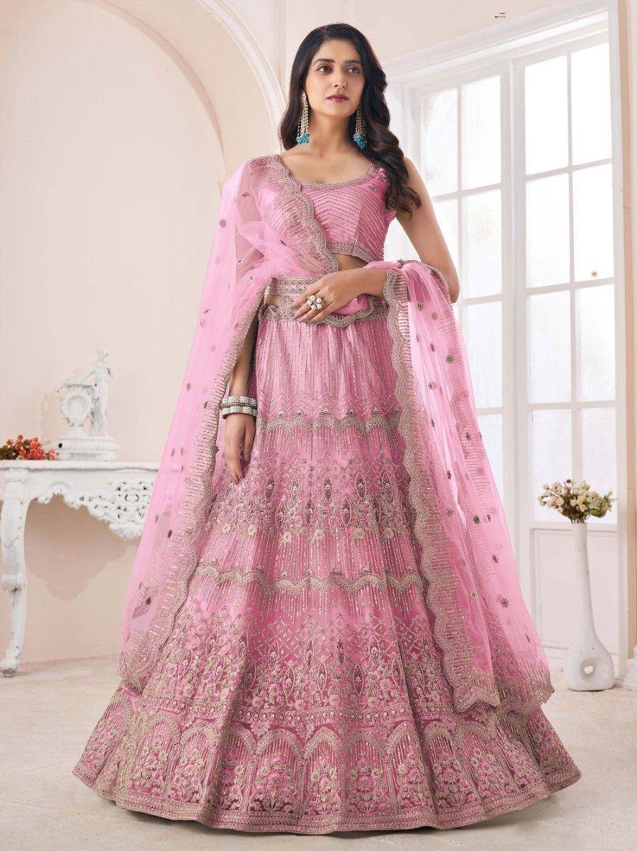 Pink designer lehenga choli with gold embroidery and sheer dupatta for Indian ethnic wear