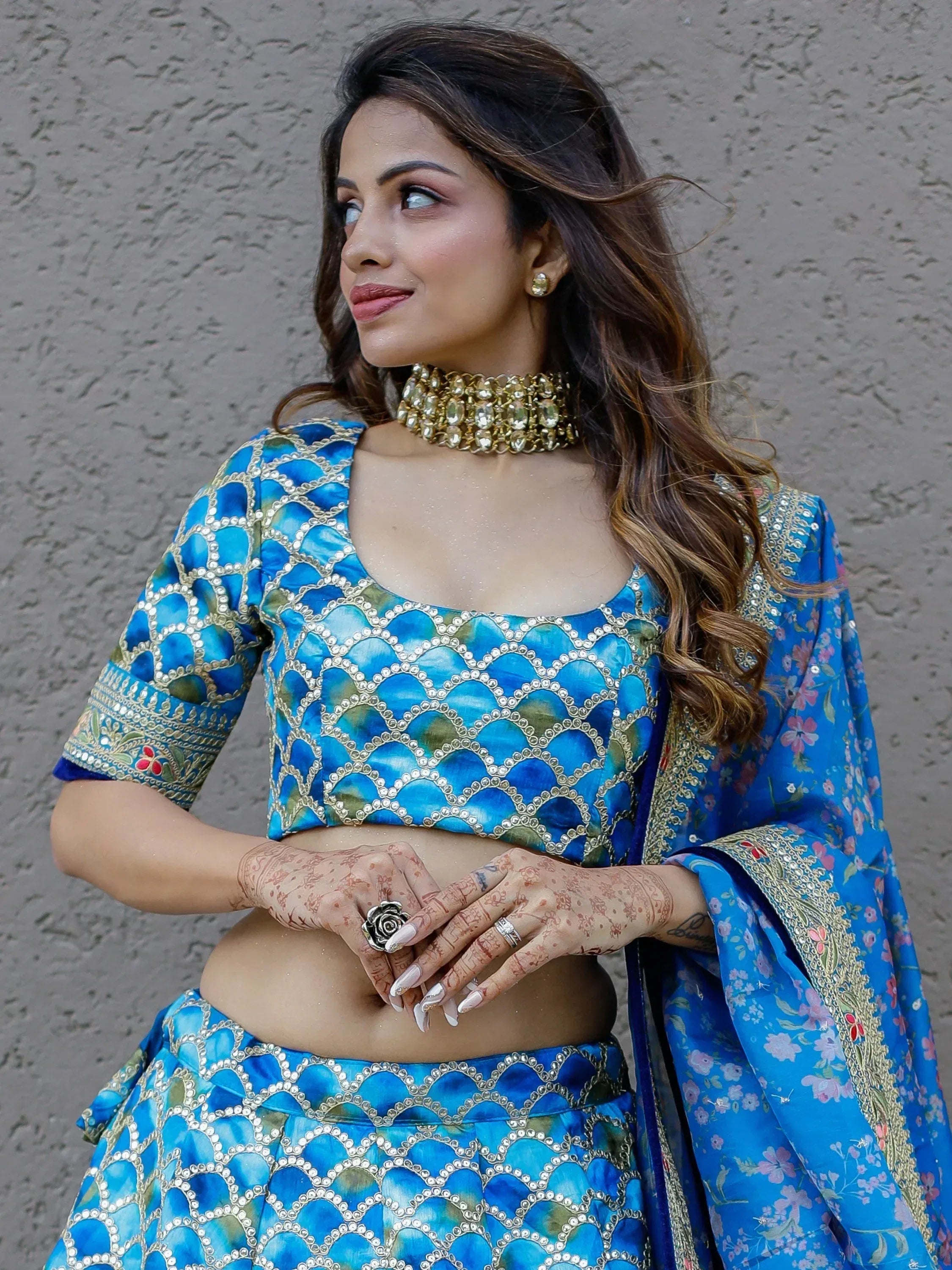 Blue designer lehenga choli with floral dupatta, perfect for Indian ethnic wear events