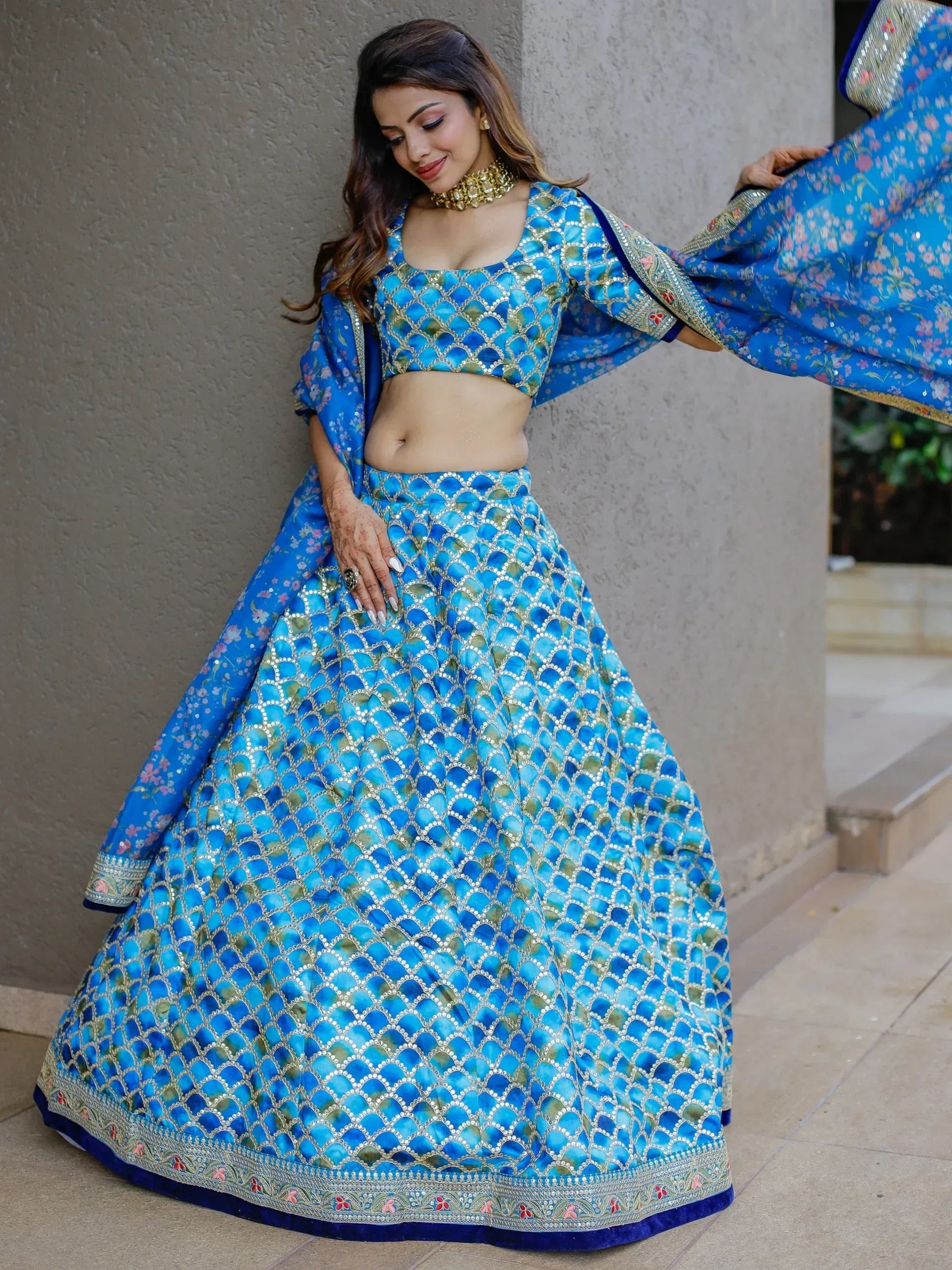 Blue designer lehenga choli with floral dupatta, perfect for Indian ethnic wear occasions