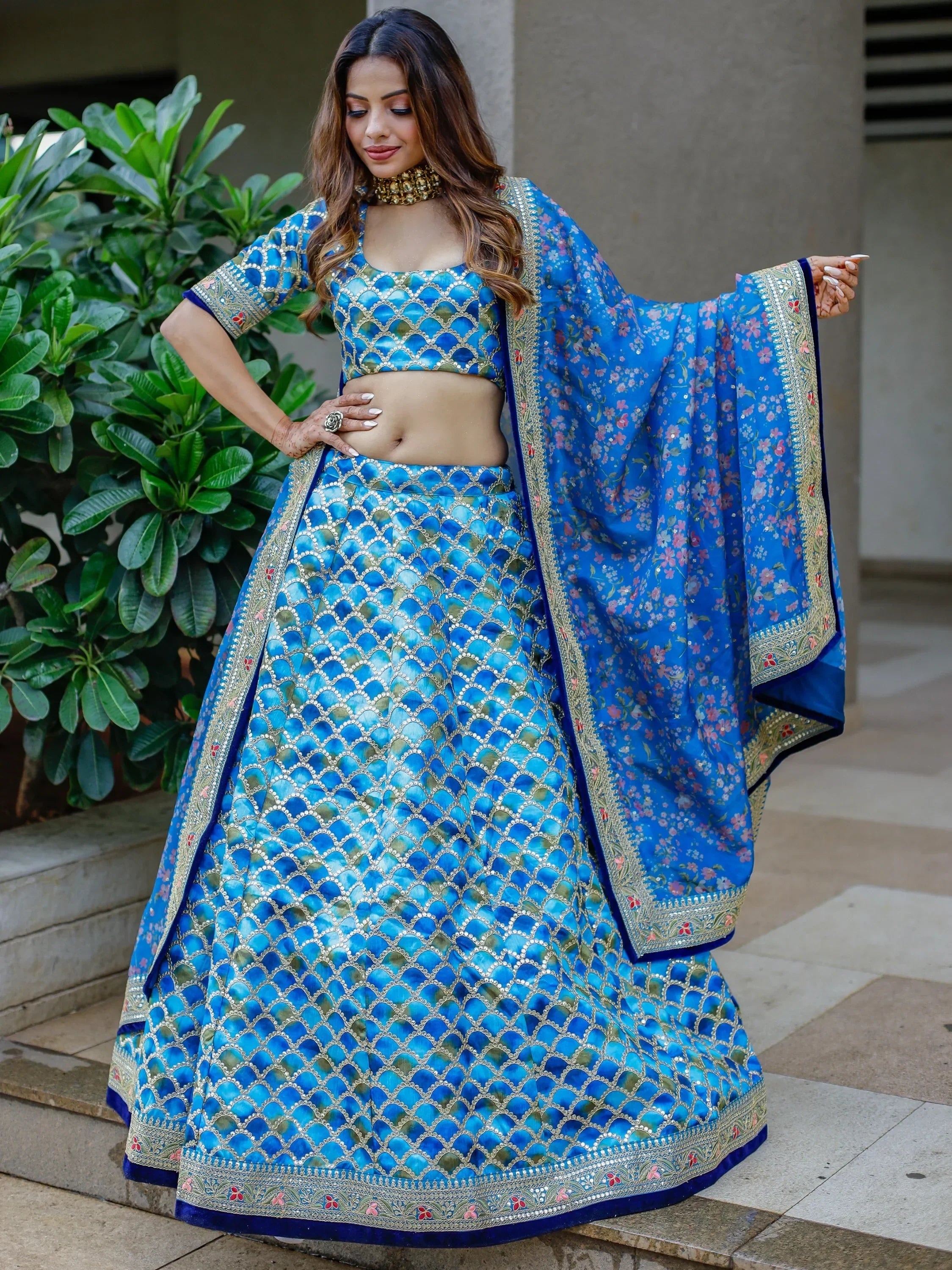 Blue designer lehenga choli with floral dupatta, perfect for Indian ethnic wear occasions