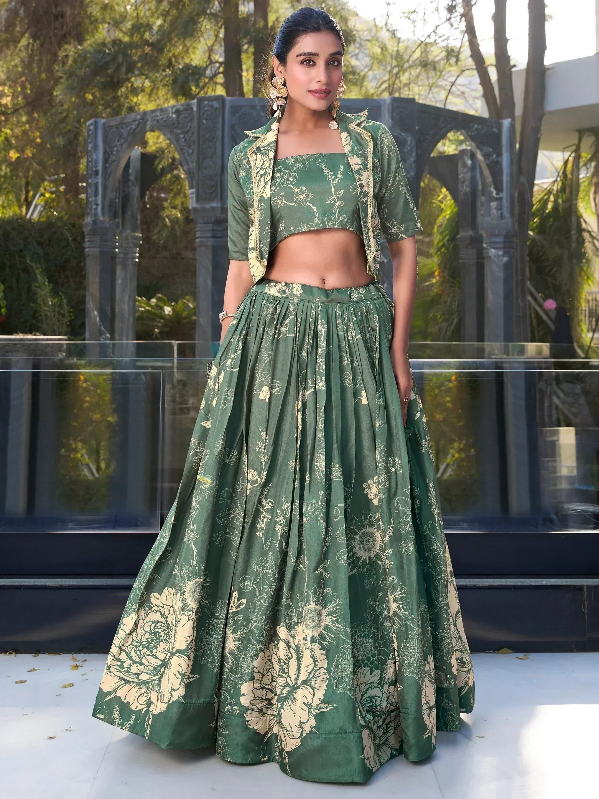 Green floral lehenga choli with gold embroidery, perfect for ethnic occasions