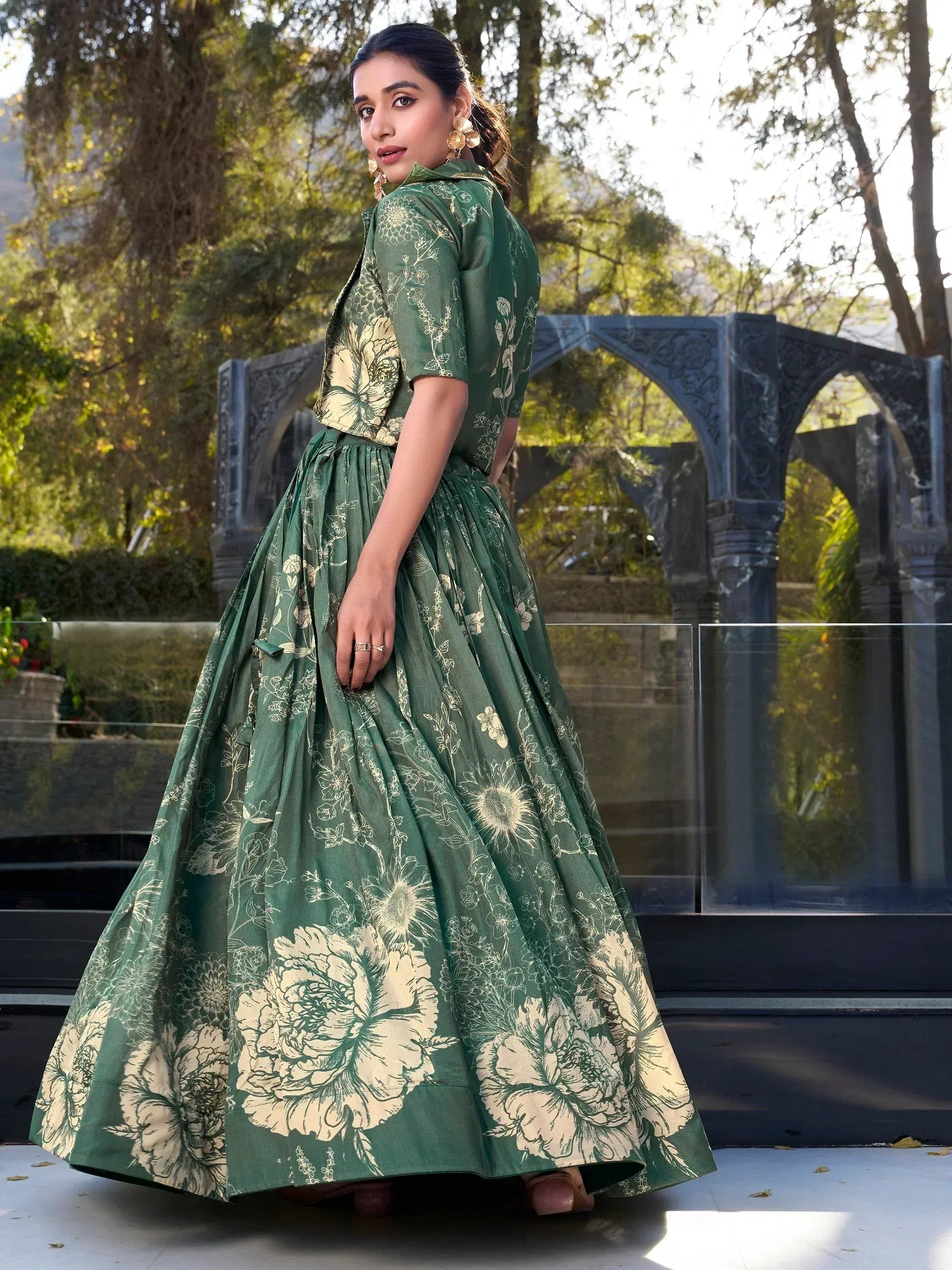 Green floral print ethnic gown with short sleeves, perfect for Indian occasions and festive wear.