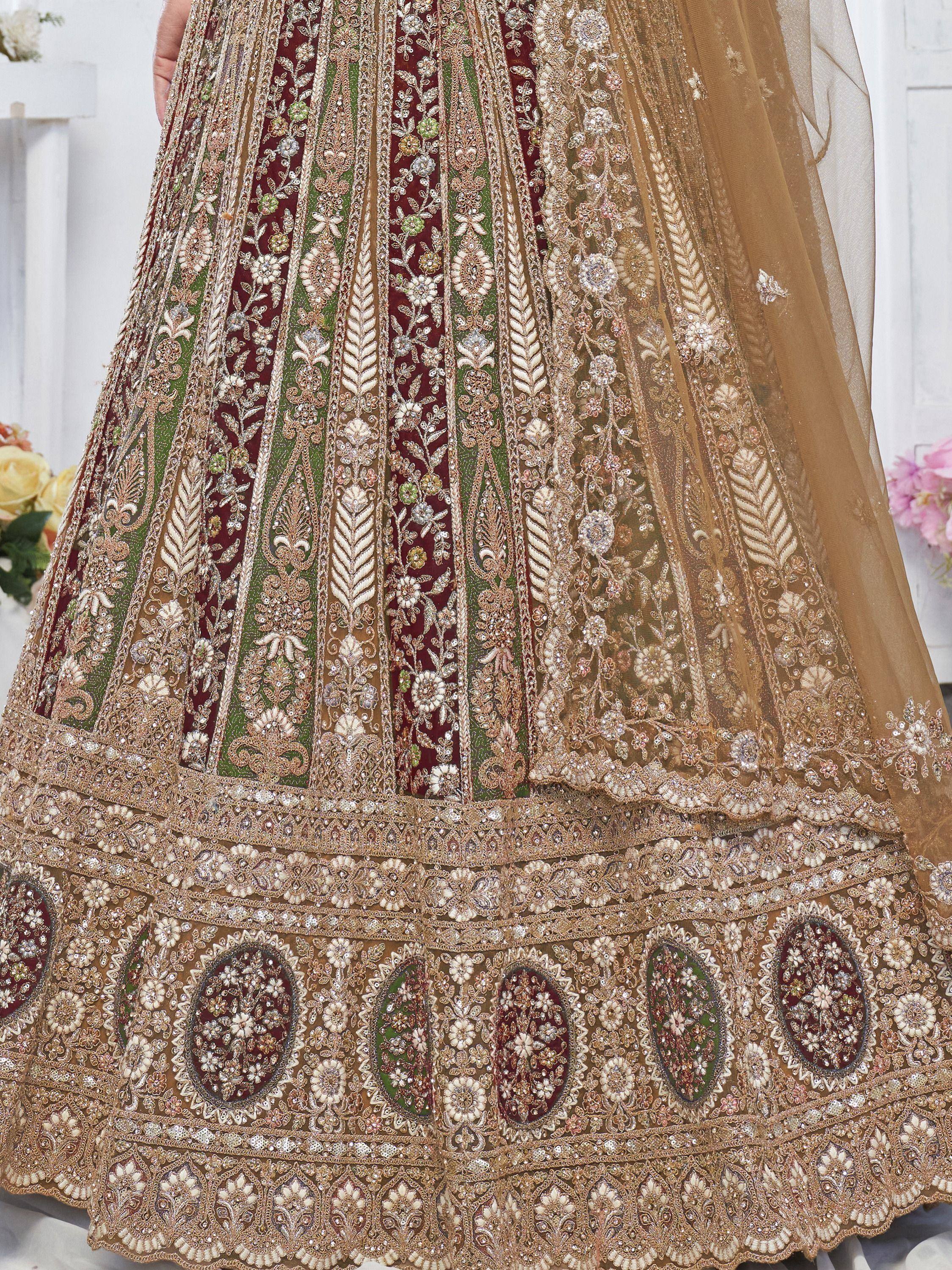 Designer lehenga choli with intricate gold, green, and maroon embroidery and beadwork for Indian ethnic wear
