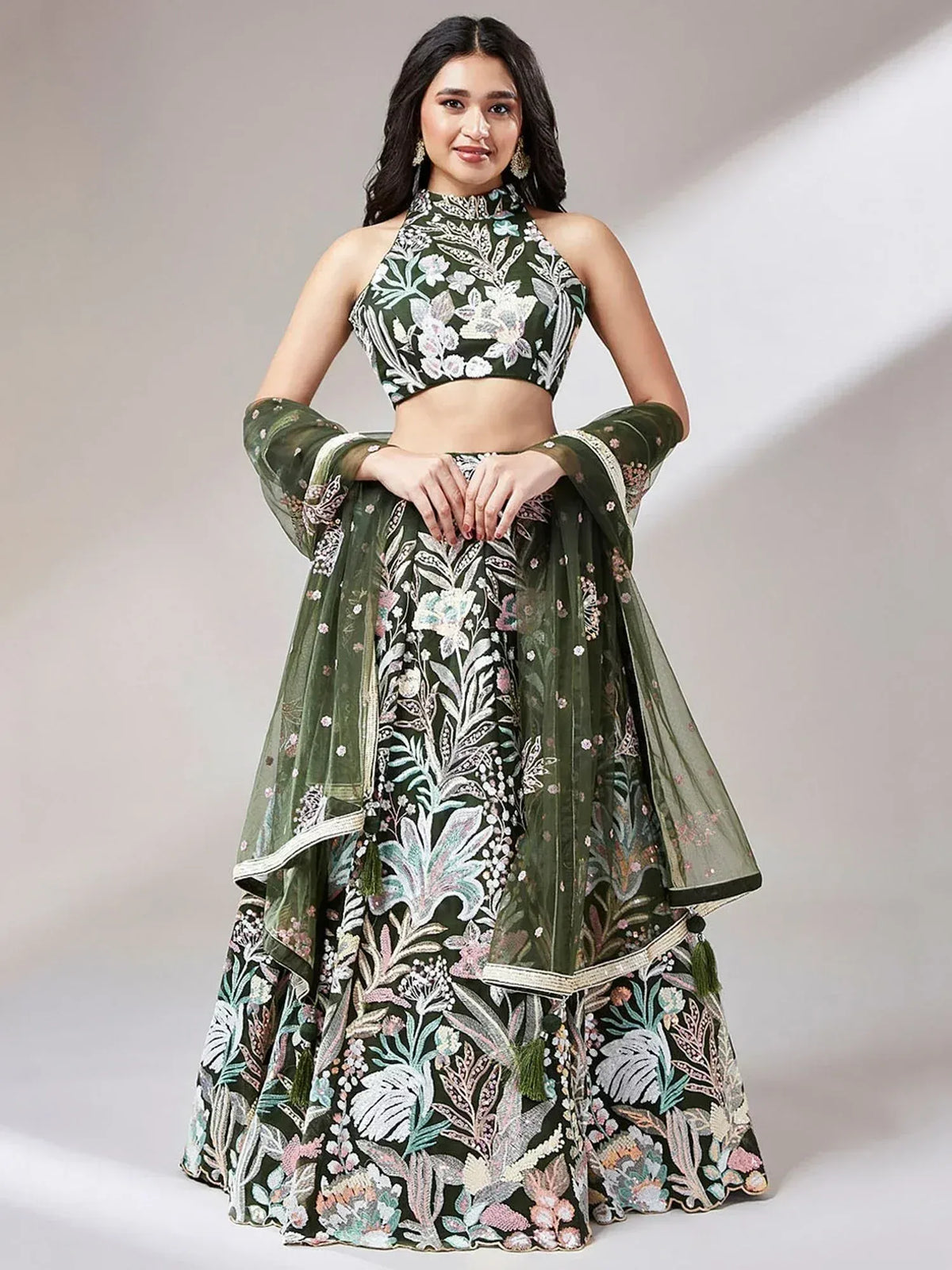 Green floral embroidered lehenga choli with halter neck crop top and sheer dupatta, Indian ethnic wear