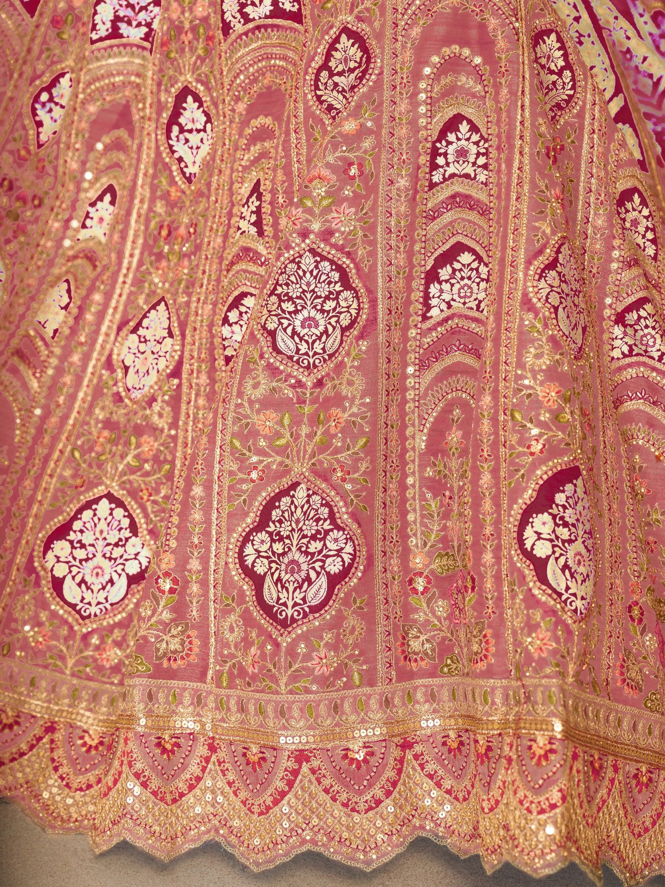 Pink designer lehenga with gold embroidery and floral motifs, Indian ethnic wear