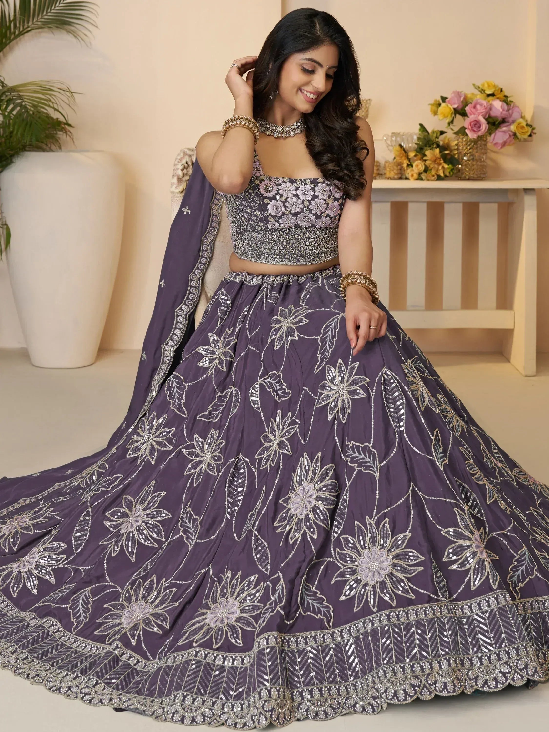 Purple floral embroidered lehenga choli with silver detailing, perfect for Indian ethnic occasions