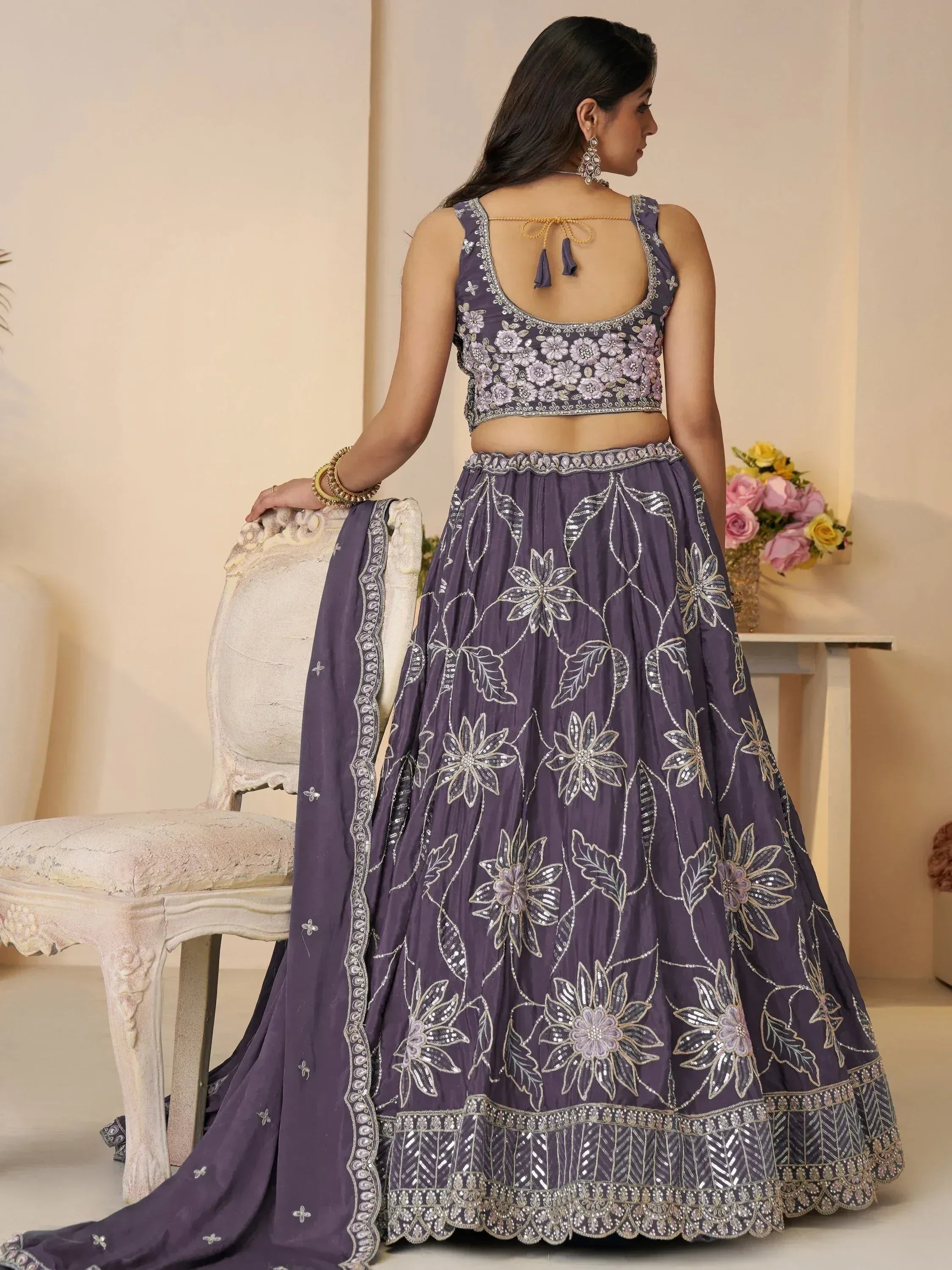 Purple floral embroidered lehenga choli with back tie blouse, perfect for Indian ethnic occasions