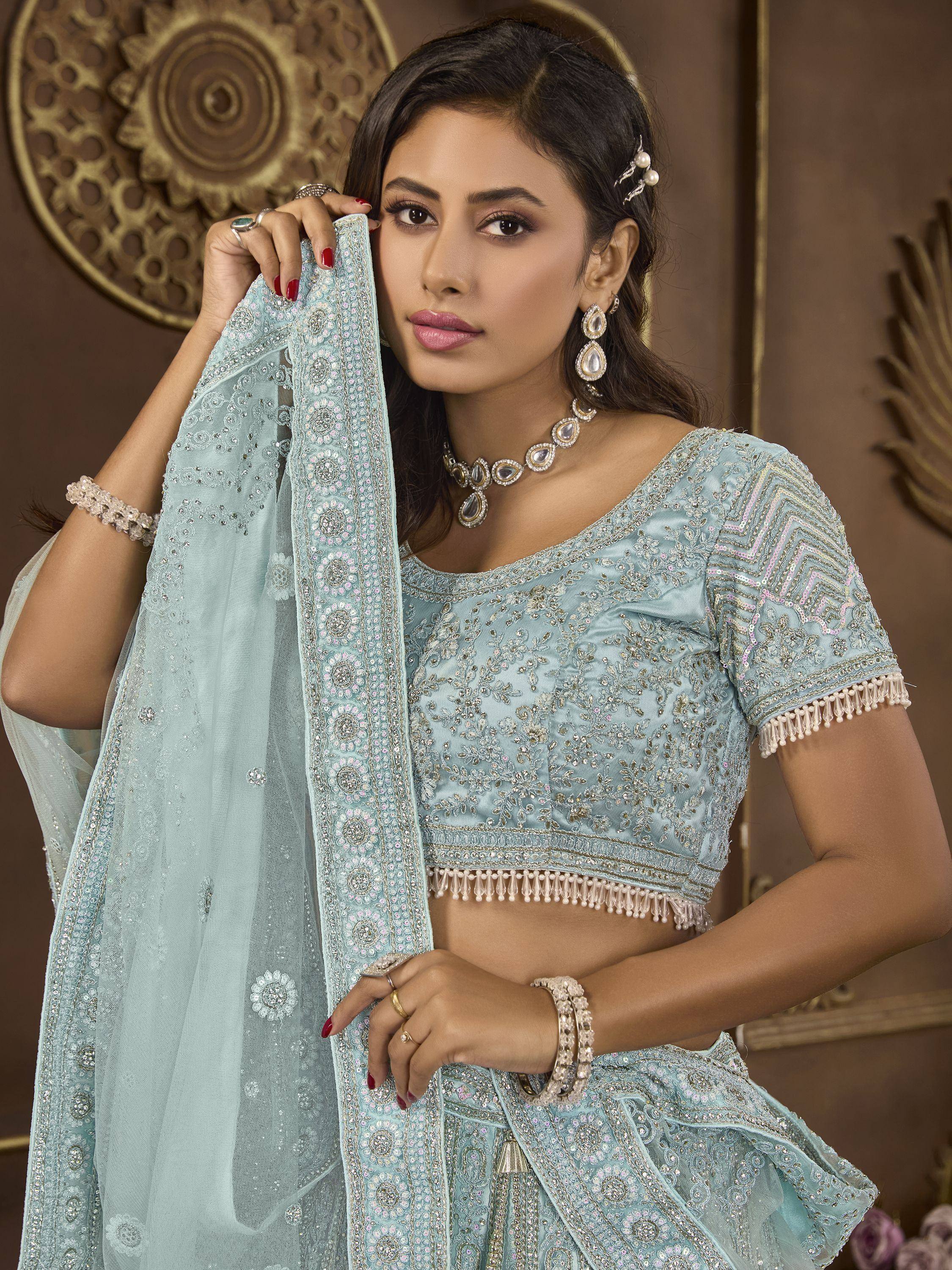 Light blue embroidered lehenga choli with matching dupatta, perfect for Indian weddings and festive occasions