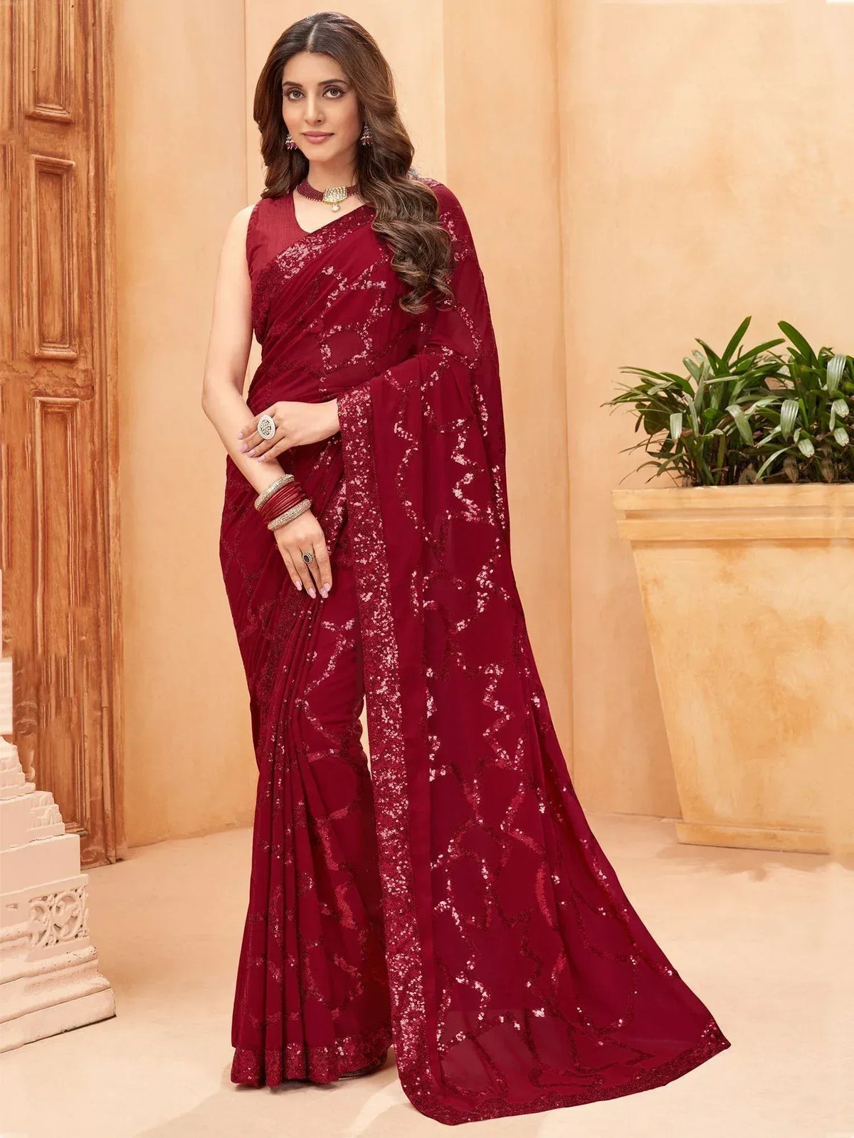 Elegant maroon saree with sequin embroidery, perfect for Indian ethnic wear occasions
