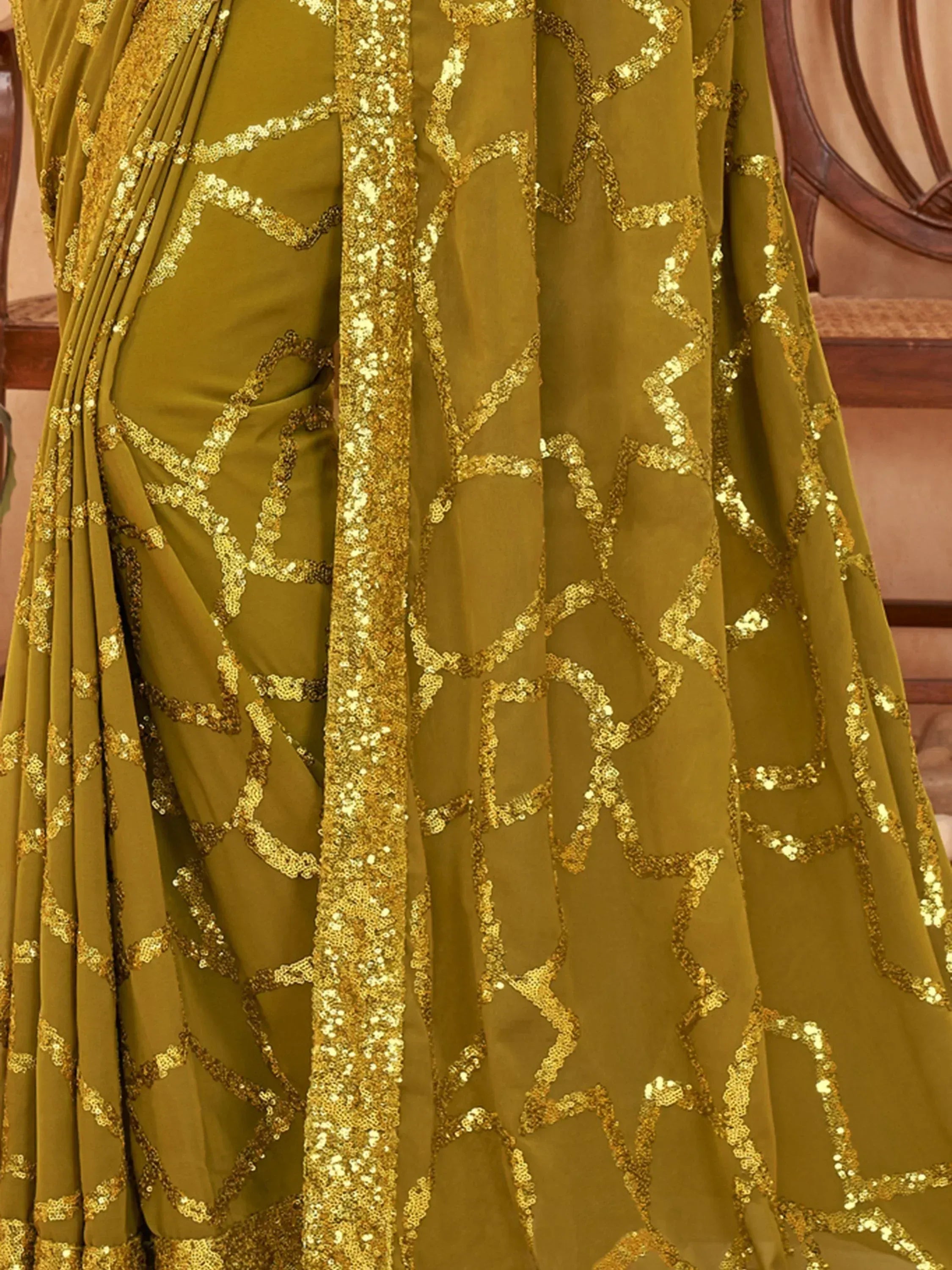 Olive green saree with gold sequin geometric patterns, elegant ethnic wear for festive occasions
