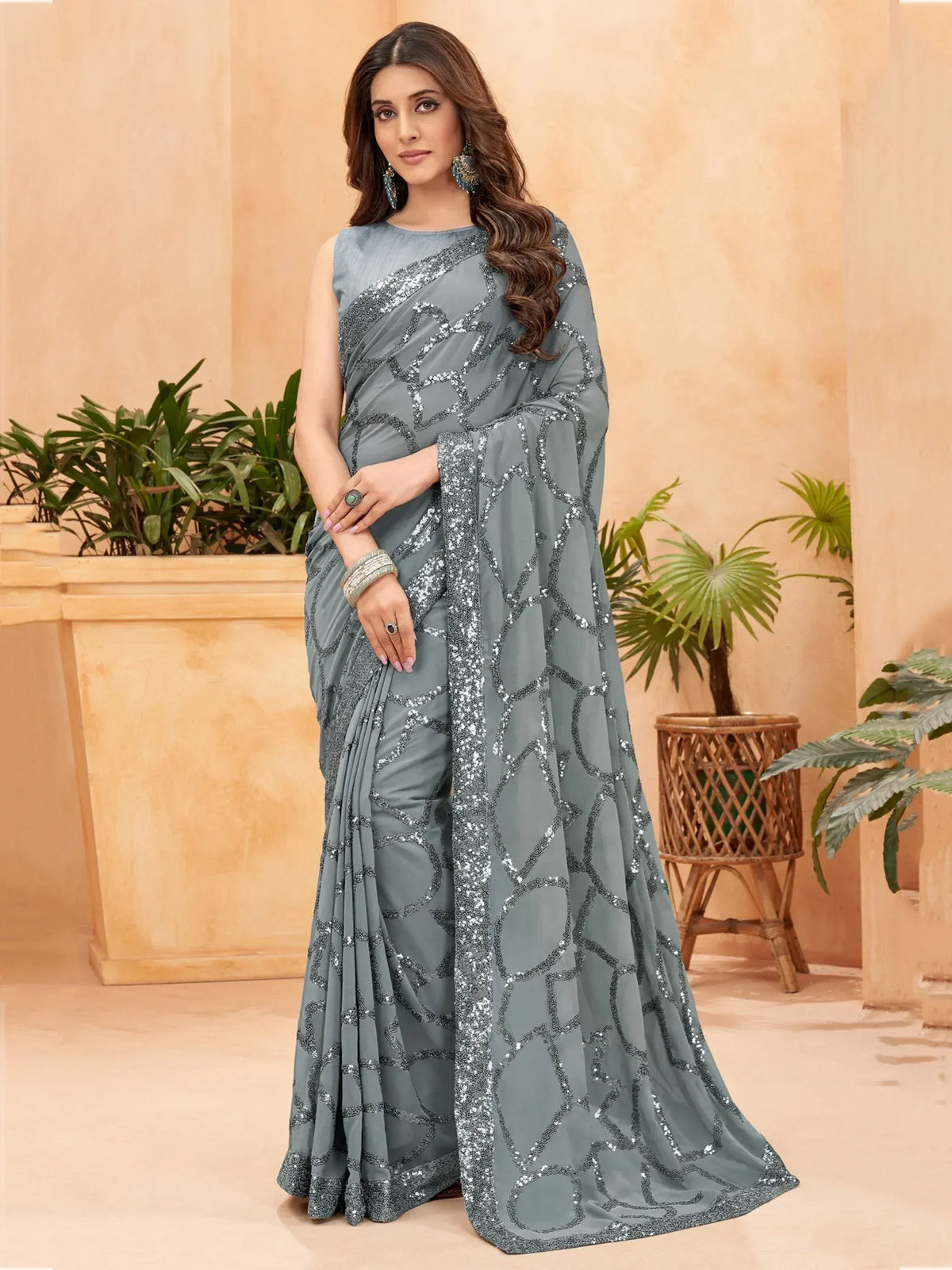 Grey designer saree with silver sequin geometric patterns, perfect for Indian ethnic wear occasions.