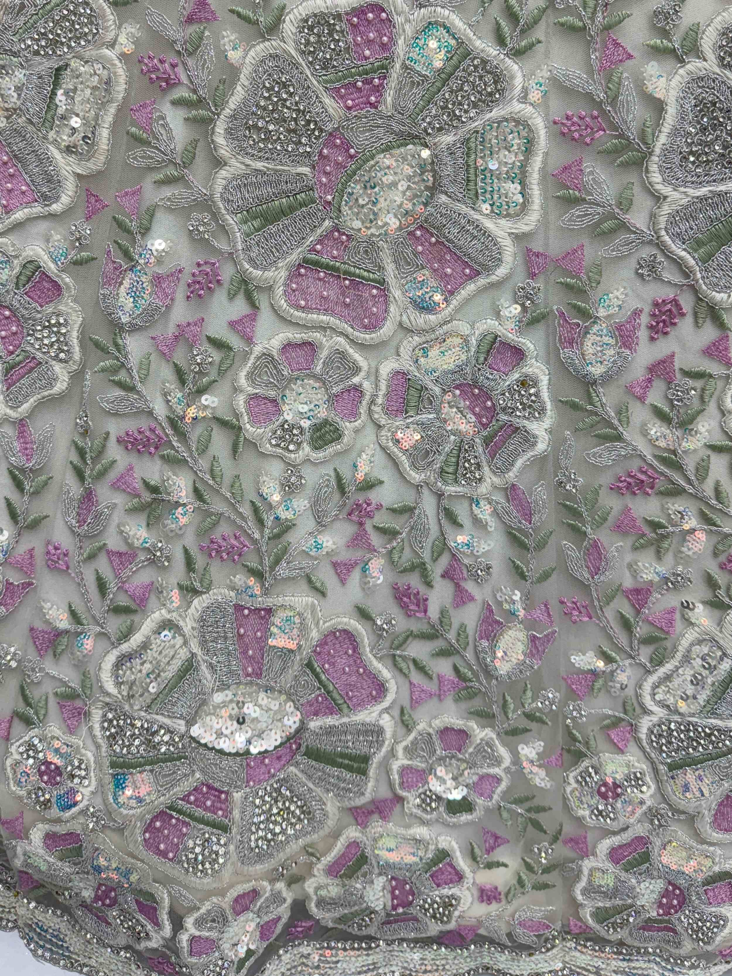 Grey floral embroidered lehenga choli with purple, green, and sequin detailing for Indian ethnic wear