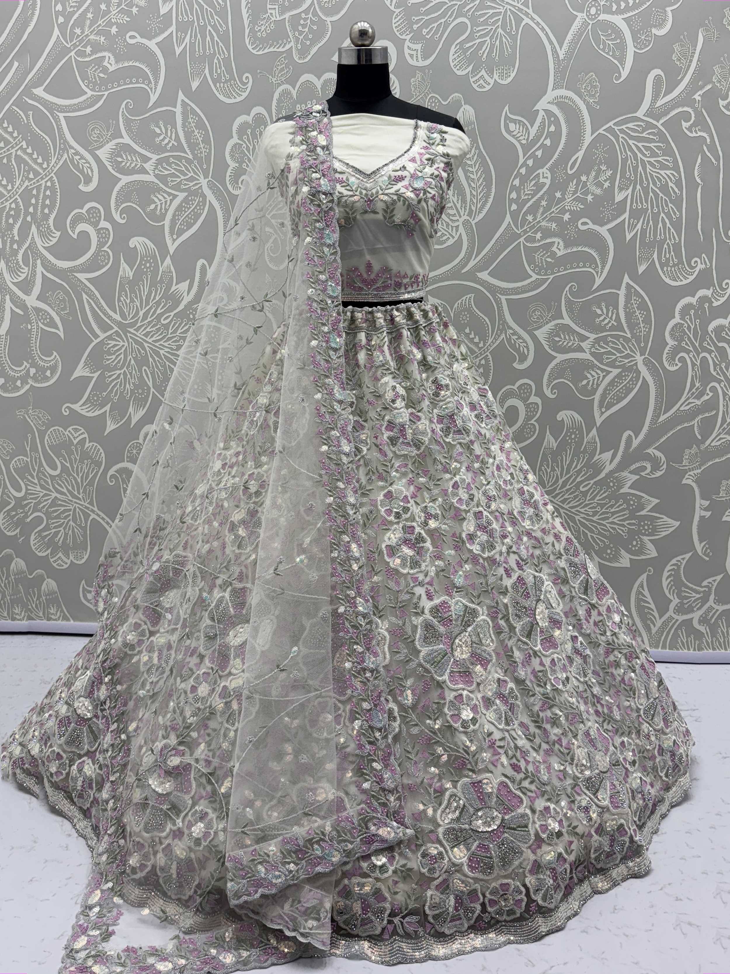 Elegant grey lehenga choli with floral embroidery and sequins, perfect for Indian ethnic wear occasions.
