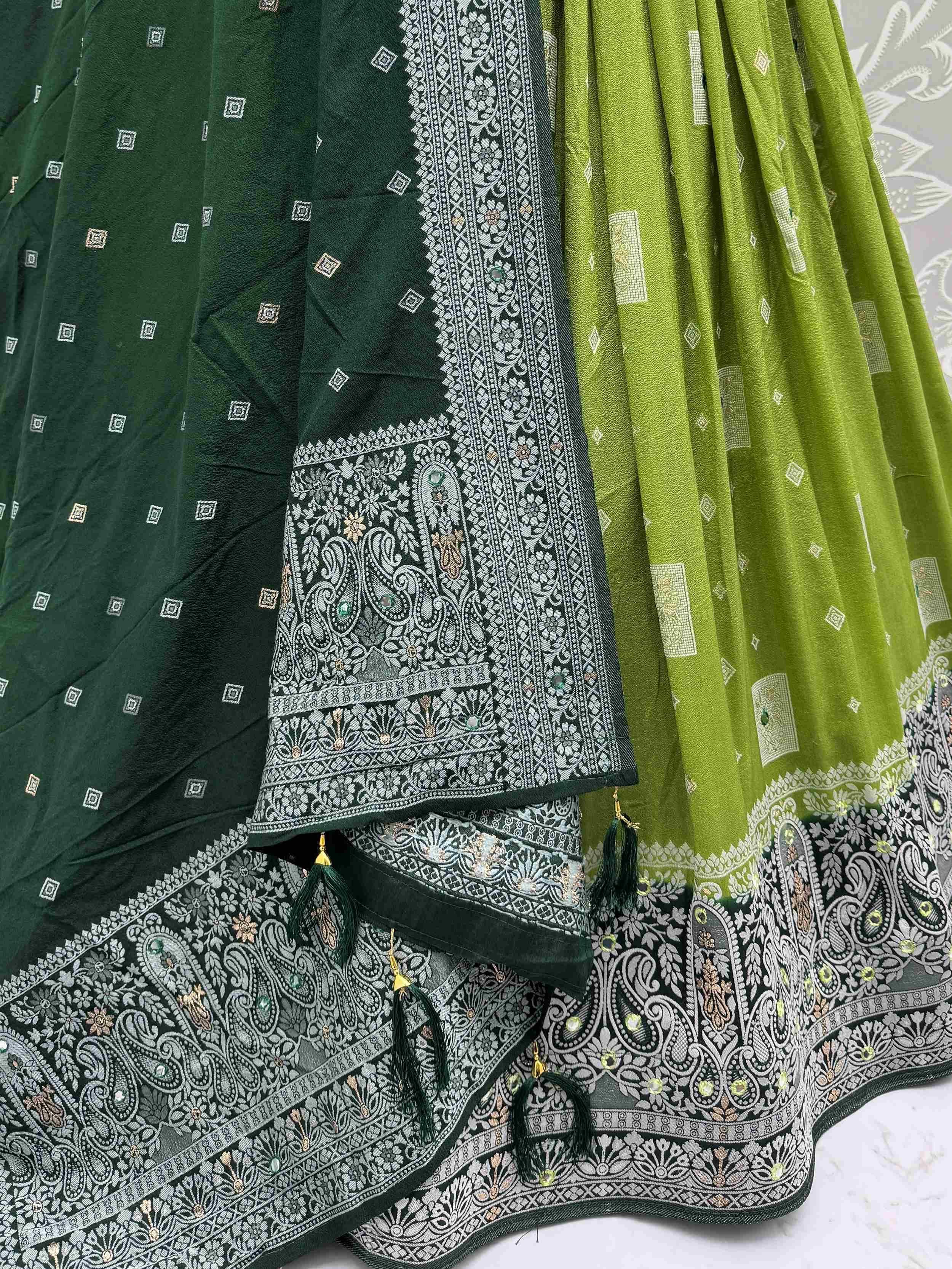 Green and lime ethnic lehenga choli with intricate paisley embroidery and tassels