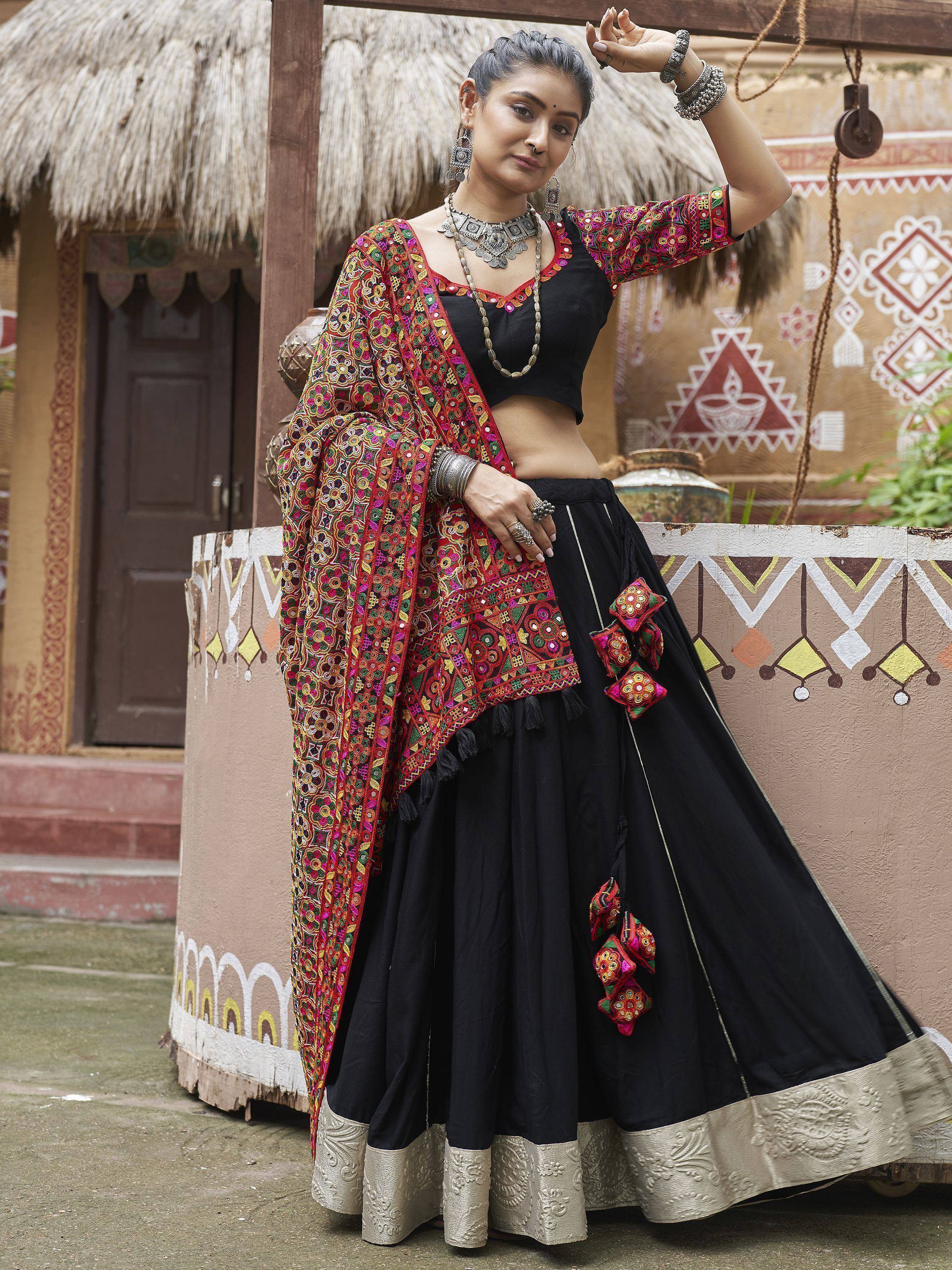 Black embroidered lehenga choli with colorful mirror work dupatta, traditional Indian ethnic wear